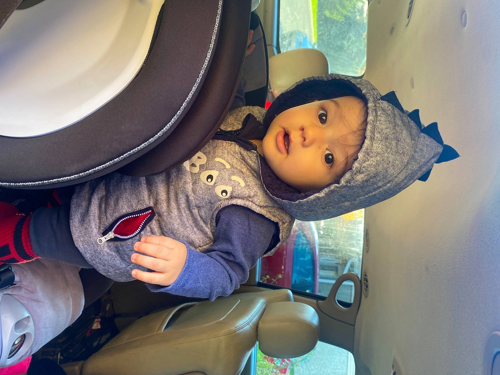 Tony is registered to the contest to win money with this photo: audio_equipment, auto_part, baby_products, baseball_cap, cap, child, costume, costume_hat, fashion_accessory, fedora, fun, hat, headgear, headwear, mascot, person, personal_protective_equipment, room, stuffed_toy, sun_hat