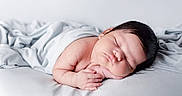 Ishvik is registered to the contest to win money with this photo: newborn, baby, sleeping, portrait, indoors, bed, blanket, white, peaceful, resting, face, hair, hands, infant, cozy, soft_lighting, closeup, bedroom, peaceful_sleep, photography