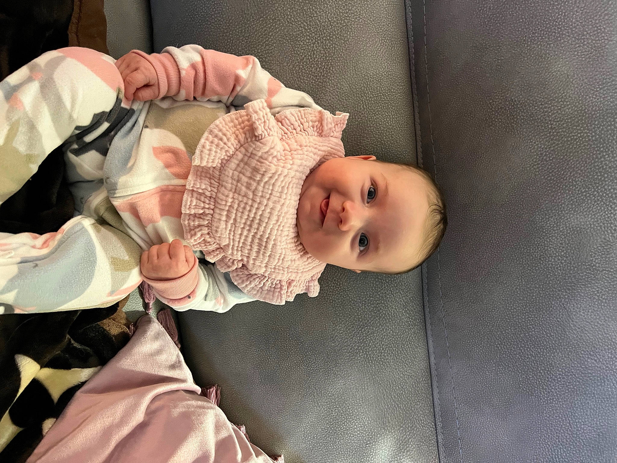 Cali is registered to the contest to win money with this photo: baby, baby_carriage, baby_products, baby_safety, baby_toddler_clothing, cheek, child, comfort, event, fashion_accessory, hat, headgear, joy, linens, pattern, person, room, skin, smile, textile