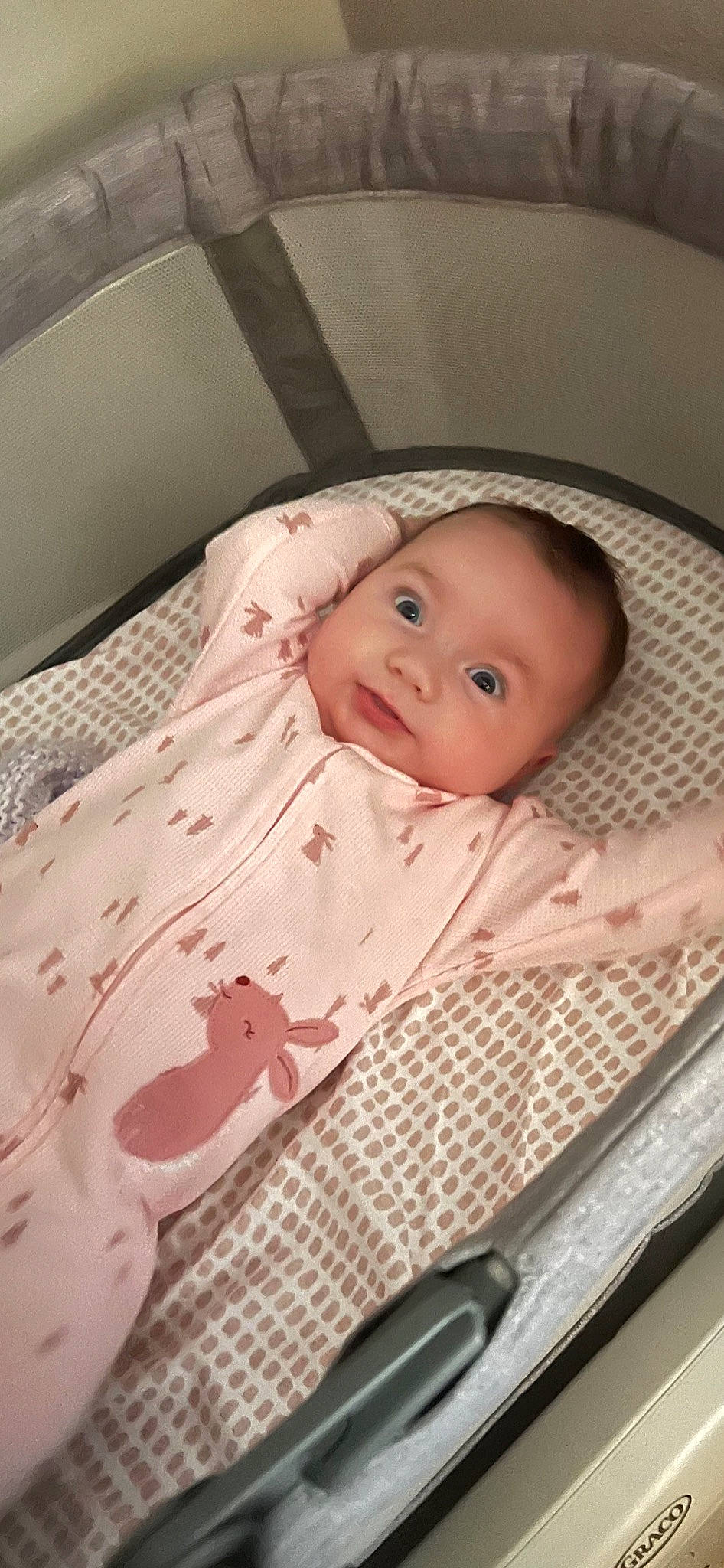 Cali is registered to the contest to win money with this photo: baby, baby_products, baby_safety, baby_toddler_clothing, bedding, cheek, child, comfort, facial_expression, head, infant_bed, iris, linens, mammal, pattern, person, room, skin, smile, textile