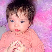 Arabella joined the competition — help win amazing prizes! baby, infant, child, face, hands, clothing, onesie, hair, pink, purple, pillow, fluffy, portrait, cute, indoors, person, skin, expression, young, resting