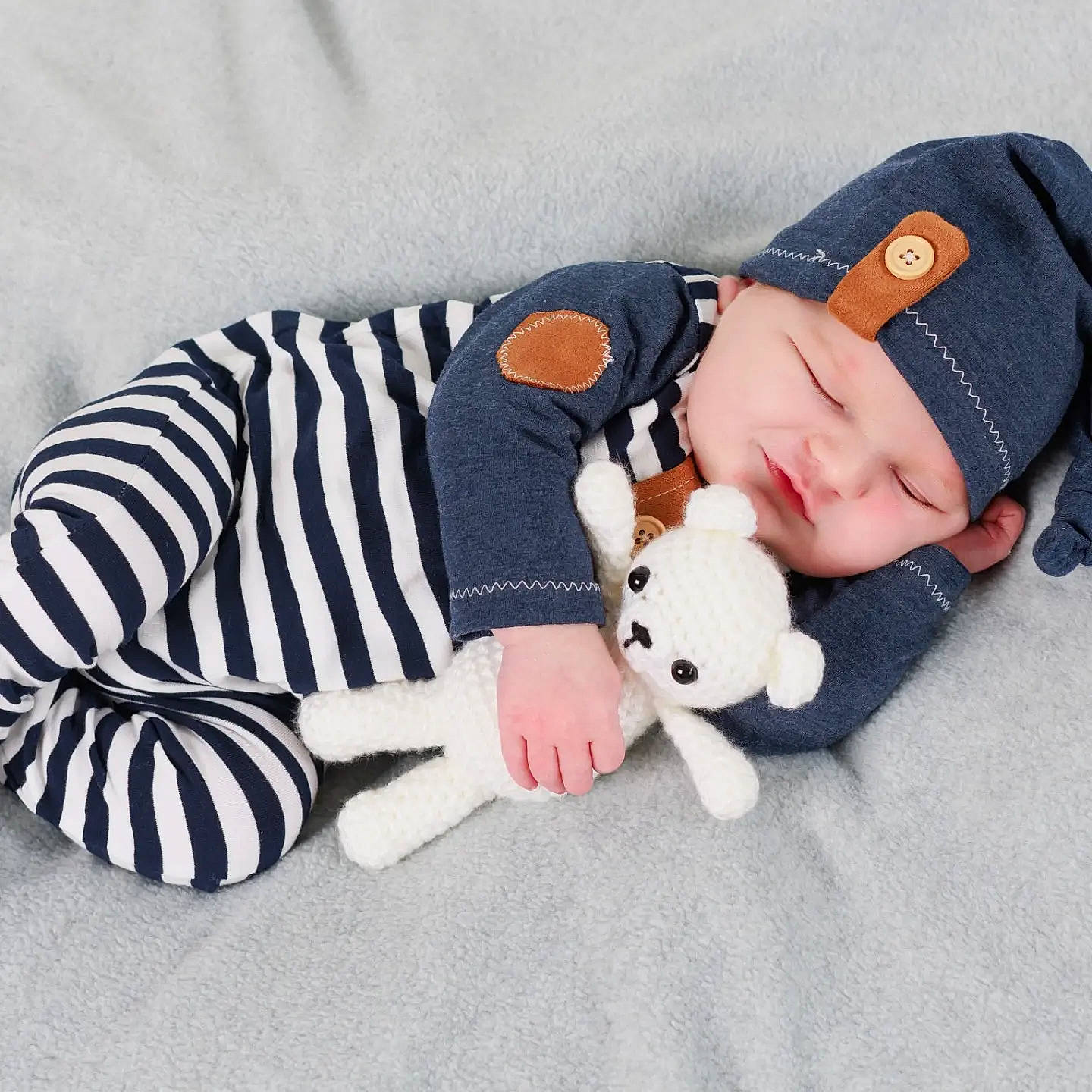 Koa joined the competition — help win amazing prizes! arm, baby, baby_sleeping, baby_toddler_clothing, child, collar, comfort, head, headgear, headwear, linens, mammal, pattern, person, product, sleeve, sock, stuffed_toy, textile, toddler