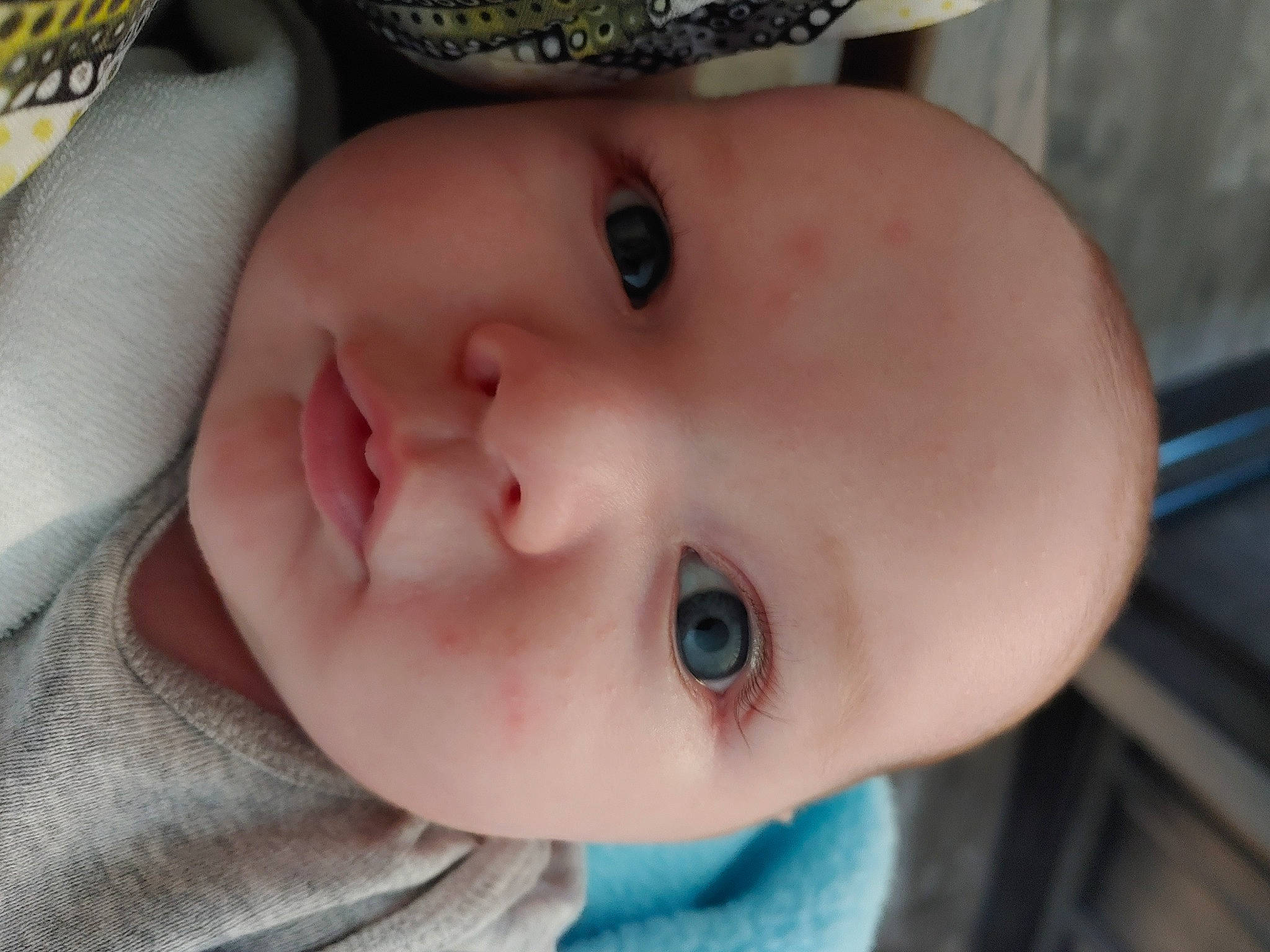 Koa is registered to the contest to win money with this photo: baby, baby_toddler_clothing, cheek, child, chin, close_up, eye, eyebrow, eyelash, face, happy, head, iris, lip, mouth, nose, person, skin, sleeve, smile