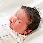 Everleigh joined the competition — help win amazing prizes! newborn, baby, sleeping, blanket, soft, striped, white, face, hair, peaceful, infant, portrait, resting, closeup, child, cute, skin, indoors, comfort, serene