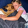 Milo joined the competition — help win amazing prizes! girl, dog, sleeping, bed, blanket, pillow, hugging, child, pet, cozy, indoor, resting, comfort, animal, cute, tired, casual_clothing, mickey_mouse, collar, peaceful