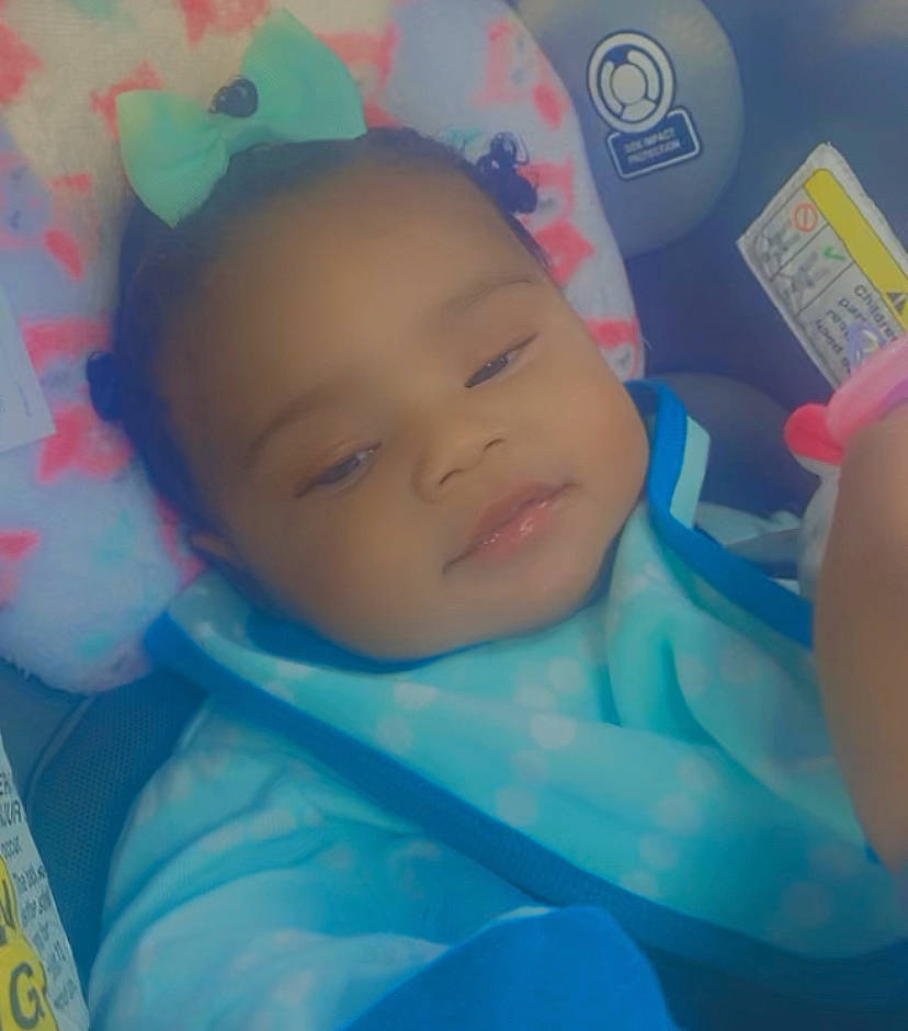 Royelle is registered to the contest to win money with this photo: baby, baby_products, baby_safety, baby_toddler_clothing, cheek, child, electric_blue, eyebrow, happy, iris, linens, lip, nose, pattern, person, pink, product, room, skin, textile