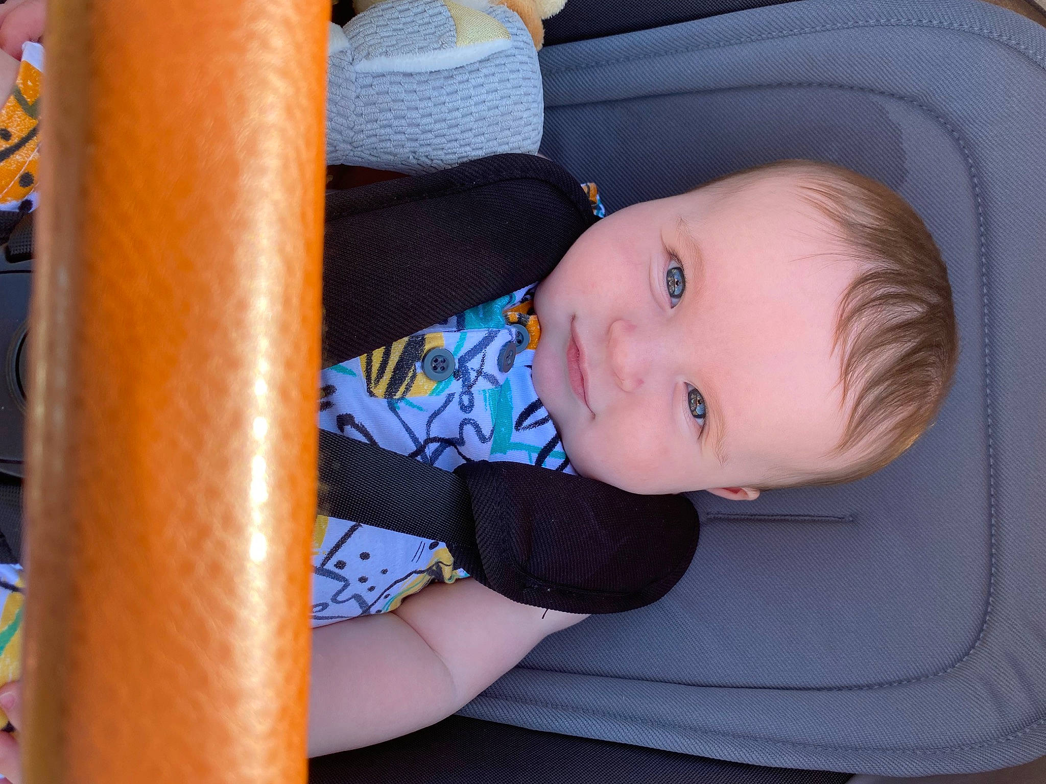 Bobby is registered to the contest to win money with this photo: auto_part, baby, baby_products, baby_toddler_clothing, car_seat, cheek, child, comfort, electric_blue, eye, fun, iris, pattern, person, sitting, sleeve, smile, toddler