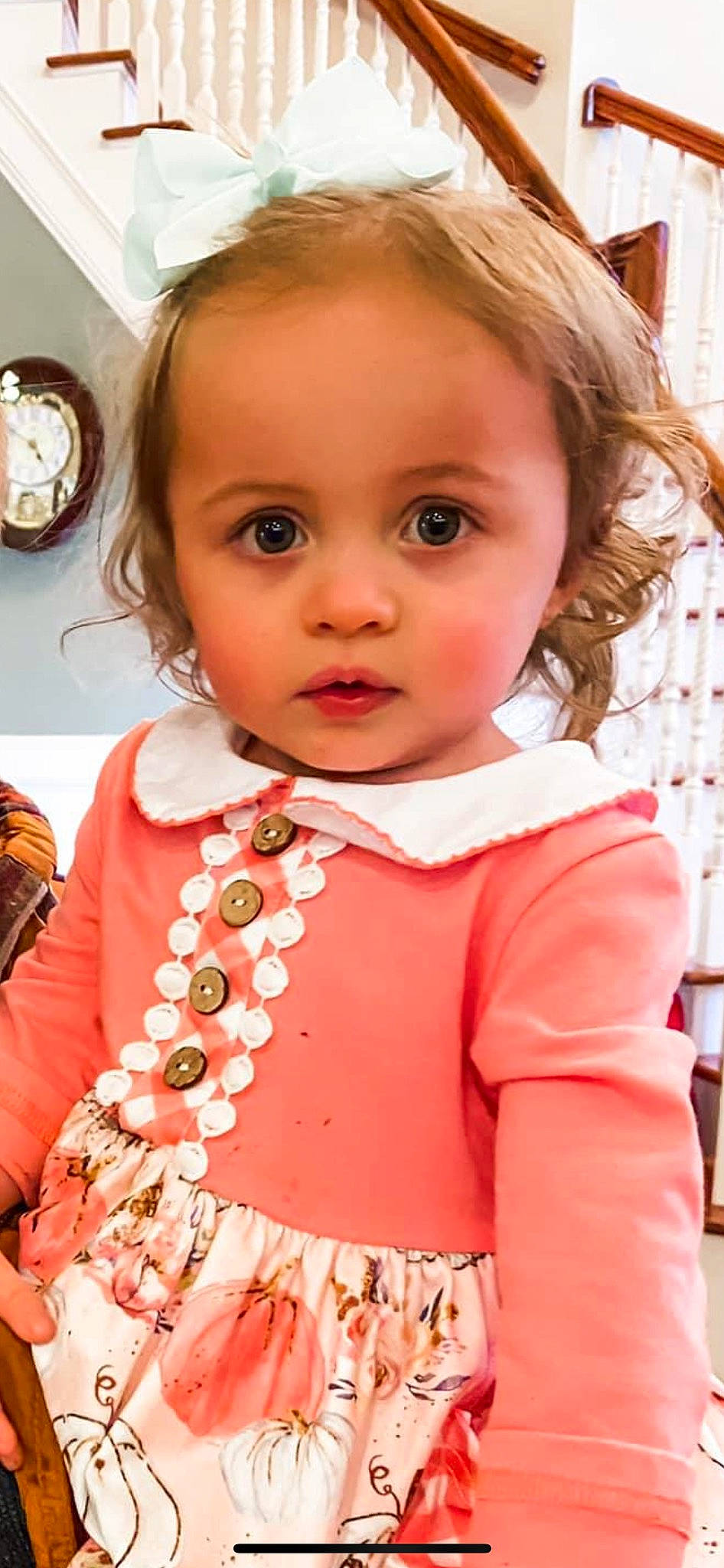 Adalyn is registered to the contest to win money with this photo: baby_toddler_clothing, blond, cheek, child, chin, clock, dress, eye, eyelash, hair, happy, head, iris, lip, nose, outerwear, person, pink, skin, sleeve