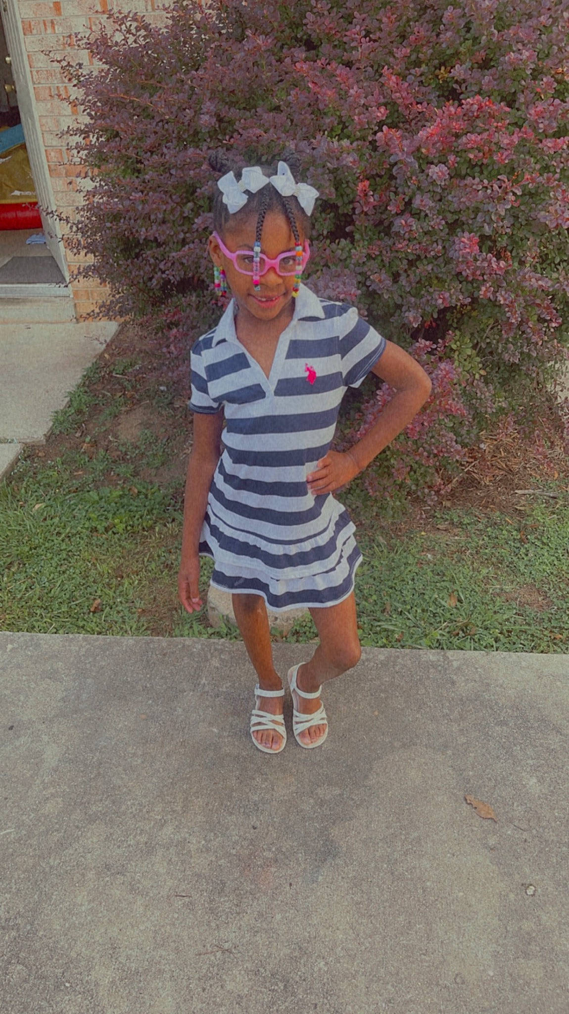 Aliyana joined the competition — help win amazing prizes! asphalt, electric_blue, eyewear, grass, hat, headgear, human_leg, magenta, pattern, person, personal_protective_equipment, plant, road_surface, shorts, sidewalk, sleeve, smile, sportswear, sunglasses, t_shirt