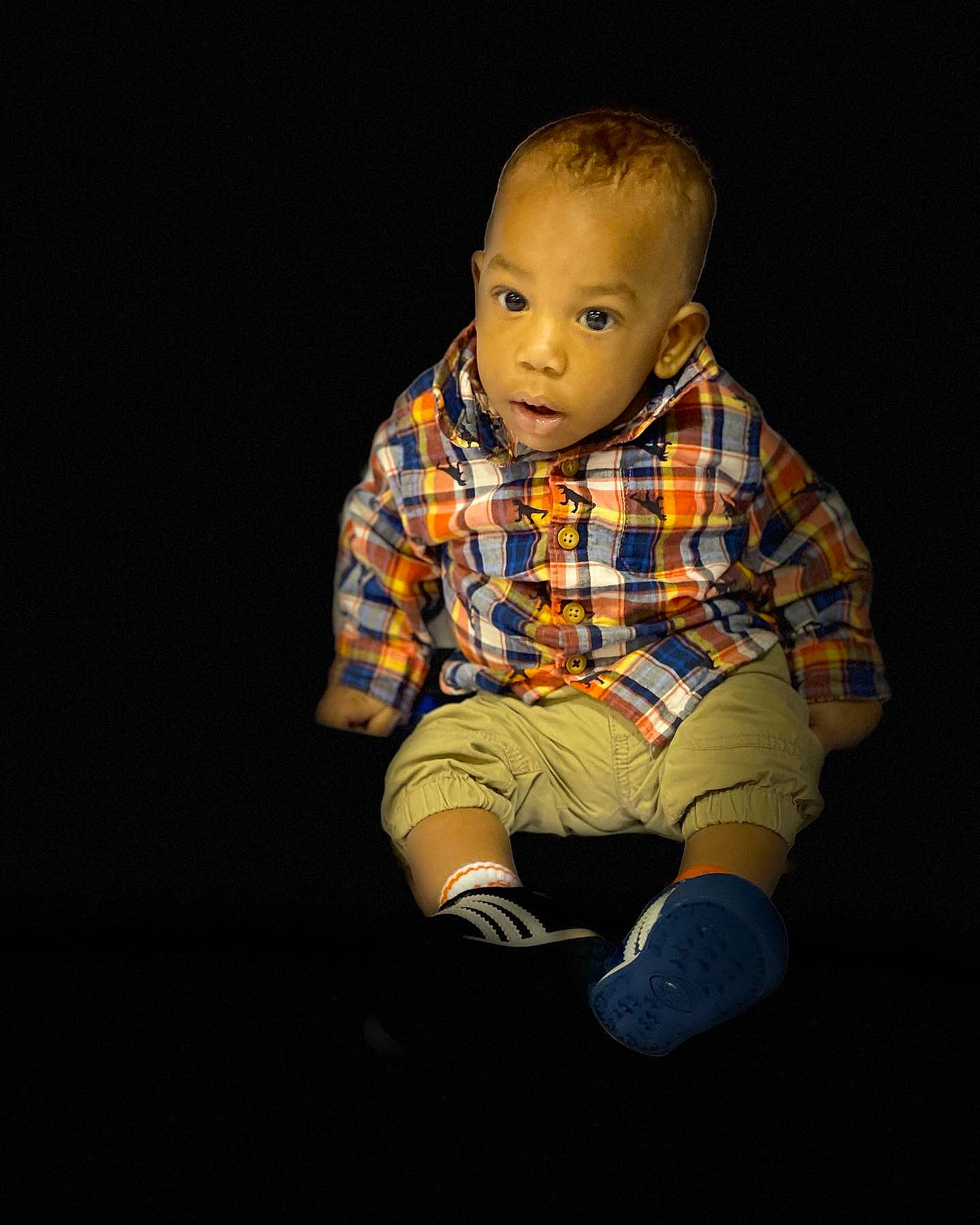 Andre joined the competition — help win amazing prizes! arm, baby, baby_toddler_clothing, cheek, child, child_model, clothing, darkness, electric_blue, flash_photography, flooring, pattern, person, plaid, portrait, portrait_photography, sitting, sleeve, toddler, toy