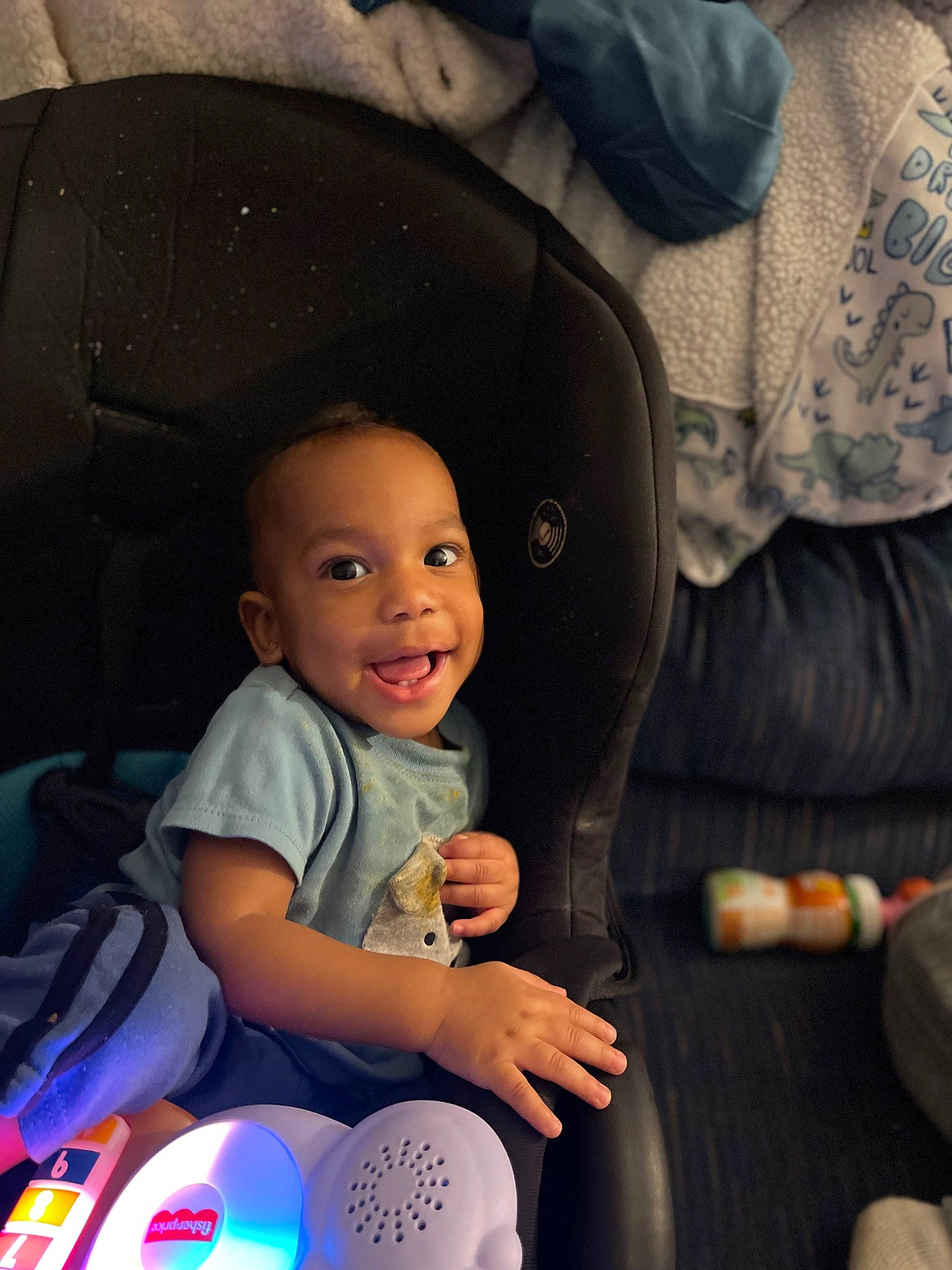 Andre is registered to the contest to win money with this photo: baby, baby_carriage, baby_products, baby_toddler_clothing, black, car_seat, child, comfort, cool, electric_blue, finger, flash_photography, fun, happy, light, mouth, person, smile, snapshot, toddler