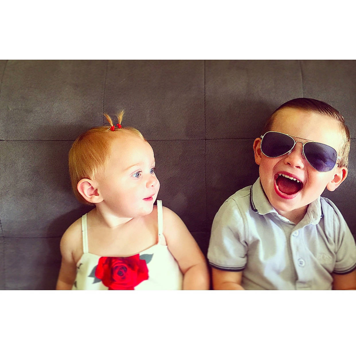 Dewis participe au concours pour gagner de l'argent avec cette photo : arm, baby_toddler_clothing, chin, clothing, ear, face, fashion, goggles, hair, hairstyle, happy, head, neck, outerwear, person, product, sleeve, smile, sunglasses, vision_care