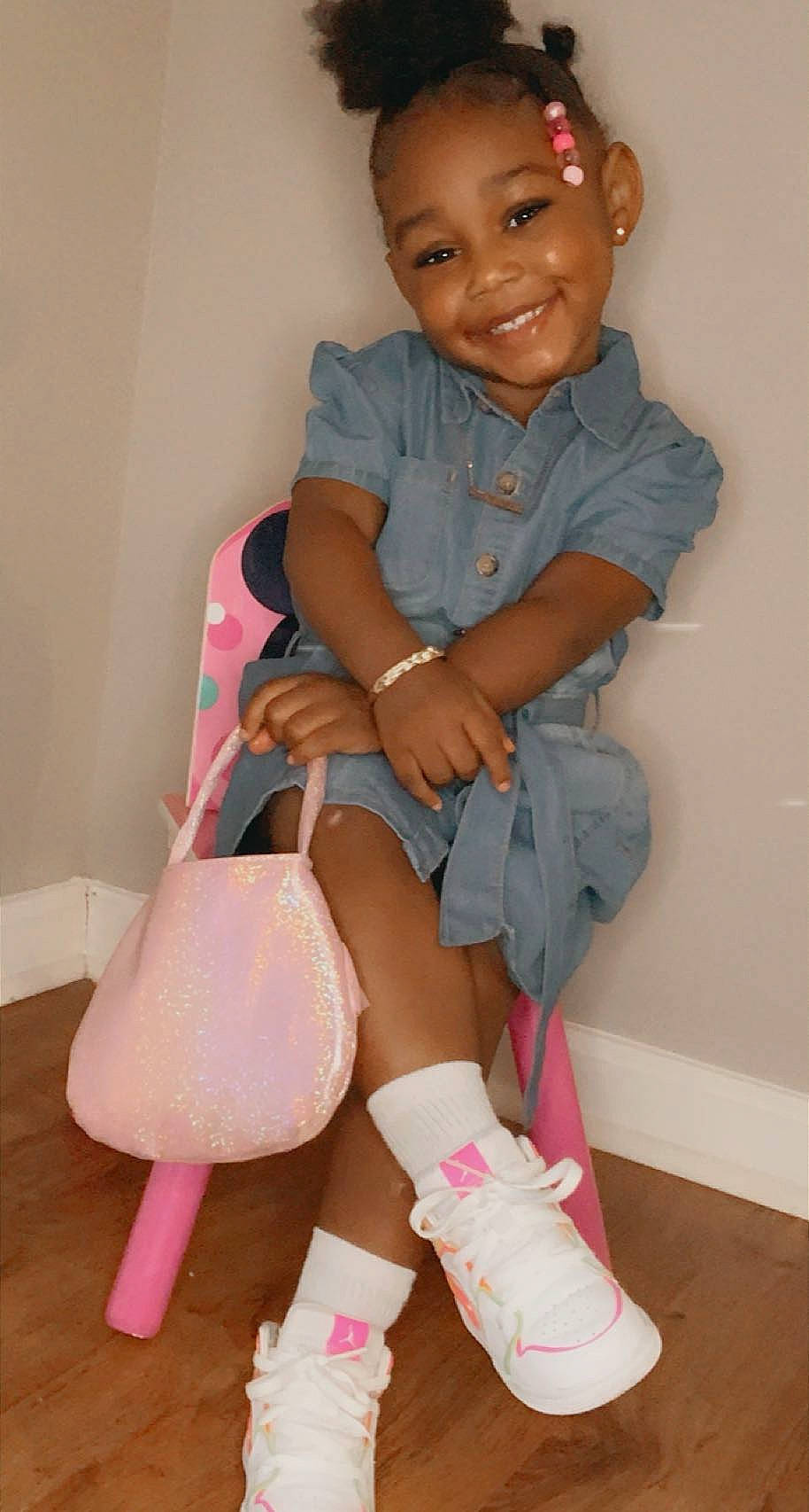 Haylen is registered to the contest to win money with this photo: baby_toddler_clothing, cheek, child, hairstyle, happy, human_leg, joint, joy, knee, lap, leg, magenta, pattern, person, pink, shorts, sleeve, smile, sock, thigh