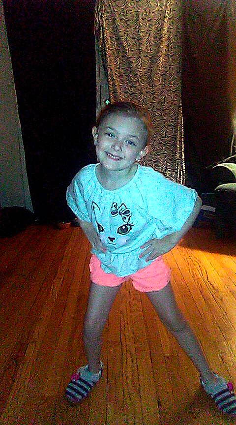 Skyla is registered to the contest to win money with this photo: child, floor, fun, joy, person, smile, standing, toddler