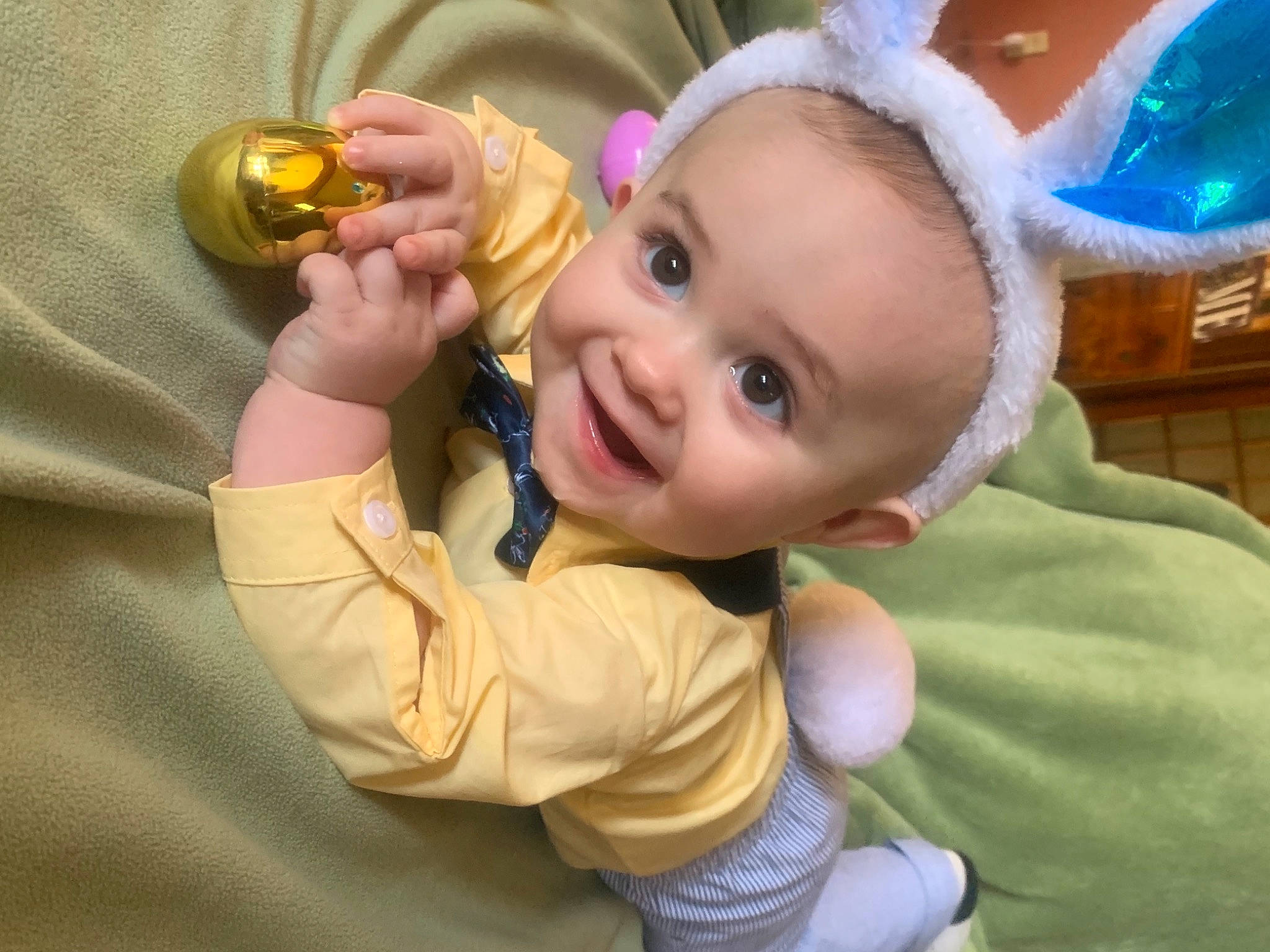 Xavier joined the competition — help win amazing prizes! baby, baby_toddler_clothing, cheek, child, christmas_ornament, ear, event, eye, finger, fun, gesture, hand, happy, iris, joy, nose, person, sitting, skin, smile