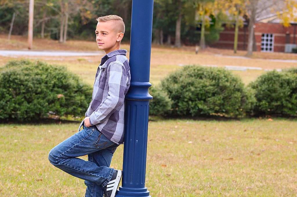 Mason is registered to the contest to win money with this photo: child, city, denim, electric_blue, fun, garden, grass, happy, jeans, leisure, park, people_in_nature, person, plant, portrait_photography, recreation, sitting, toddler, tree, woody_plant