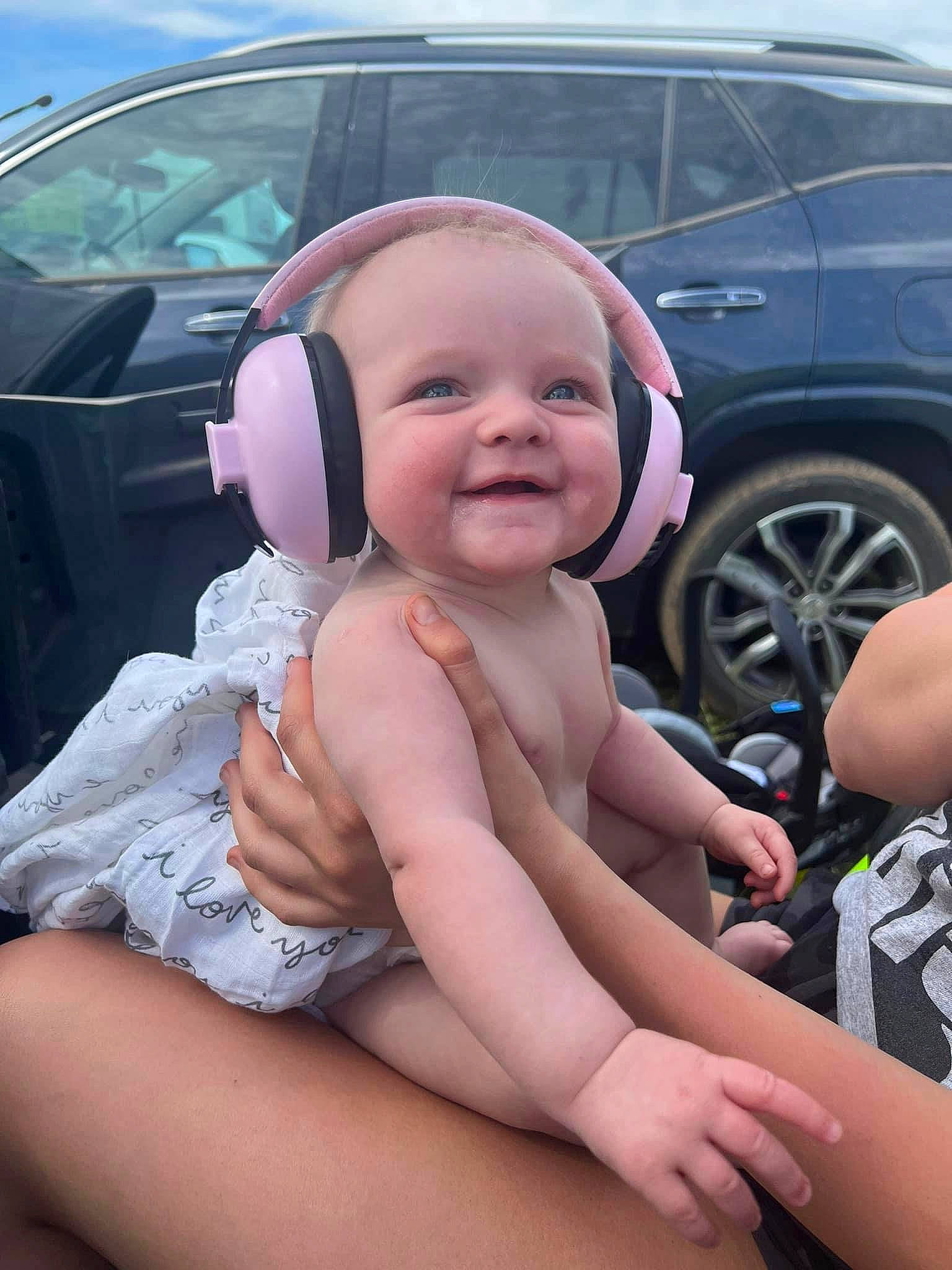 Georgia joined the competition — help win amazing prizes! auto_part, automotive_design, automotive_exterior, automotive_tire, baby_toddler_clothing, car, cool, finger, happy, joy, leg, mammal, motor_vehicle, person, smile, steering_wheel, thumb, tire, toddler, vehicle