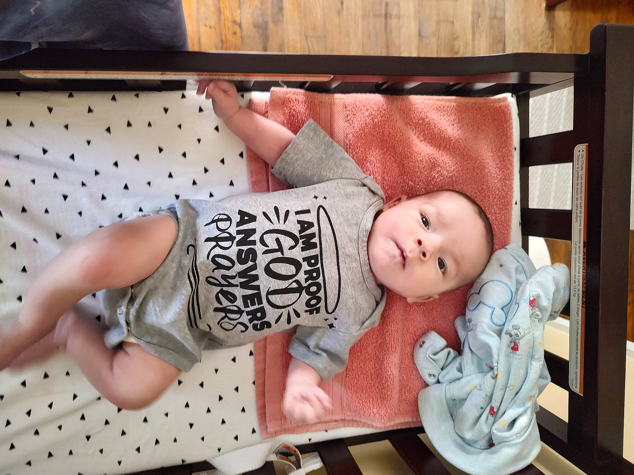 Shiloh is registered to the contest to win money with this photo: baby, baby_products, baby_safety, baby_sleeping, baby_toddler_clothing, bedding, child, comfort, cradle, foot, infant_bed, linens, pattern, person, room, sitting, skin, sleeve, textile, toddler