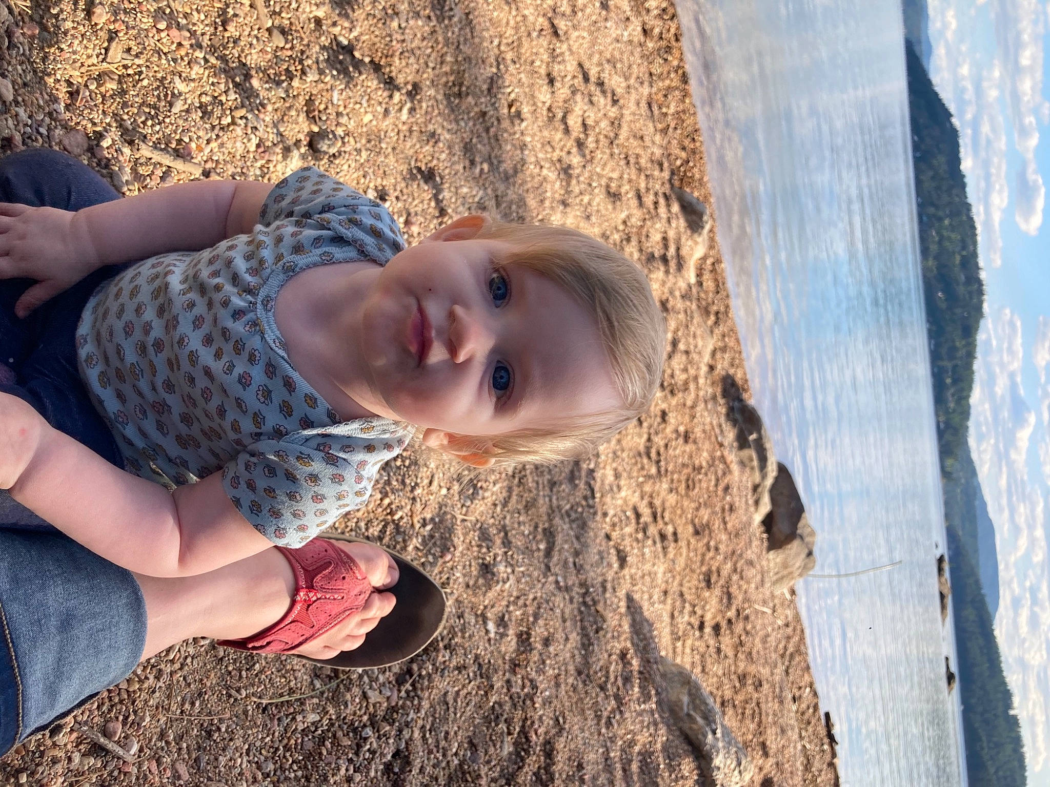 Laurel is registered to the contest to win money with this photo: azure, beach, blond, child, electric_blue, eyewear, fun, grass, happy, head, landscape, leisure, people_in_nature, person, play, sand, skin, smile, toddler, water