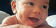 Samuel joined the competition — help win amazing prizes! baby, smiling, happy, face, dimples, infant, skin, hands, resting, closeup, cute, child, portrait, person, newborn, expression, young, indoors, soft_light, joy