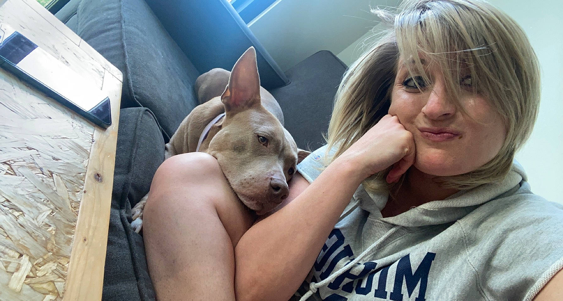 Lena is registered to the contest to win money with this photo: carnivore, comfort, companion_dog, dog, dog_breed, ear, fawn, felidae, fun, gesture, hand, happy, mammal, mouth, skin, smile, snout, t_shirt, vertebrate, whiskers