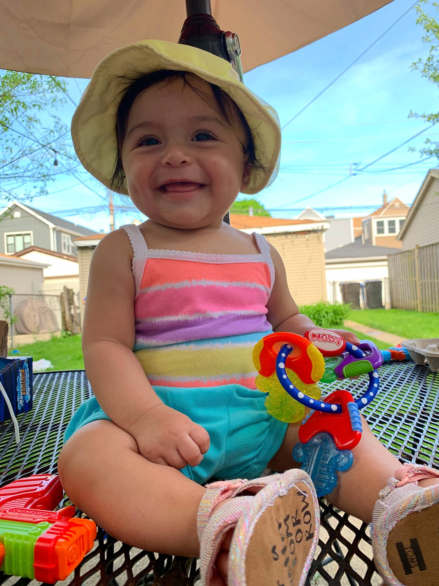 Abella joined the competition — help win amazing prizes! baby, child, fashion_accessory, fun, hat, headgear, headwear, joy, leg, leisure, person, play, recreation, sitting, skin, smile, summer, sun_hat, toddler, vacation