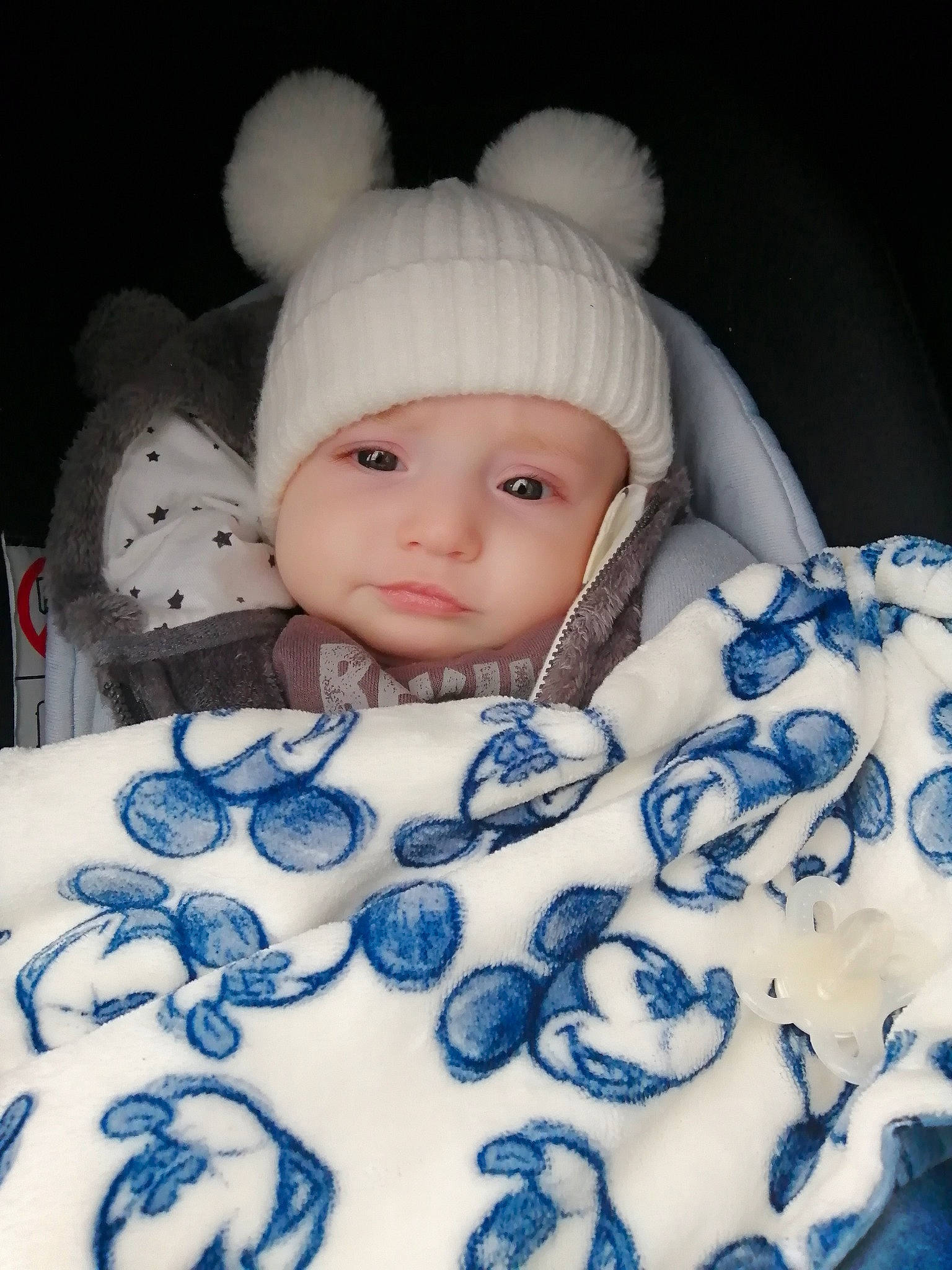 Isaac-lee is registered to the contest to win money with this photo: baby, baby_toddler_clothing, cap, doll, eyebrow, eyelash, fur, grey, headgear, headwear, human_body, iris, knit_cap, linens, lip, outerwear, pattern, person, skin, white