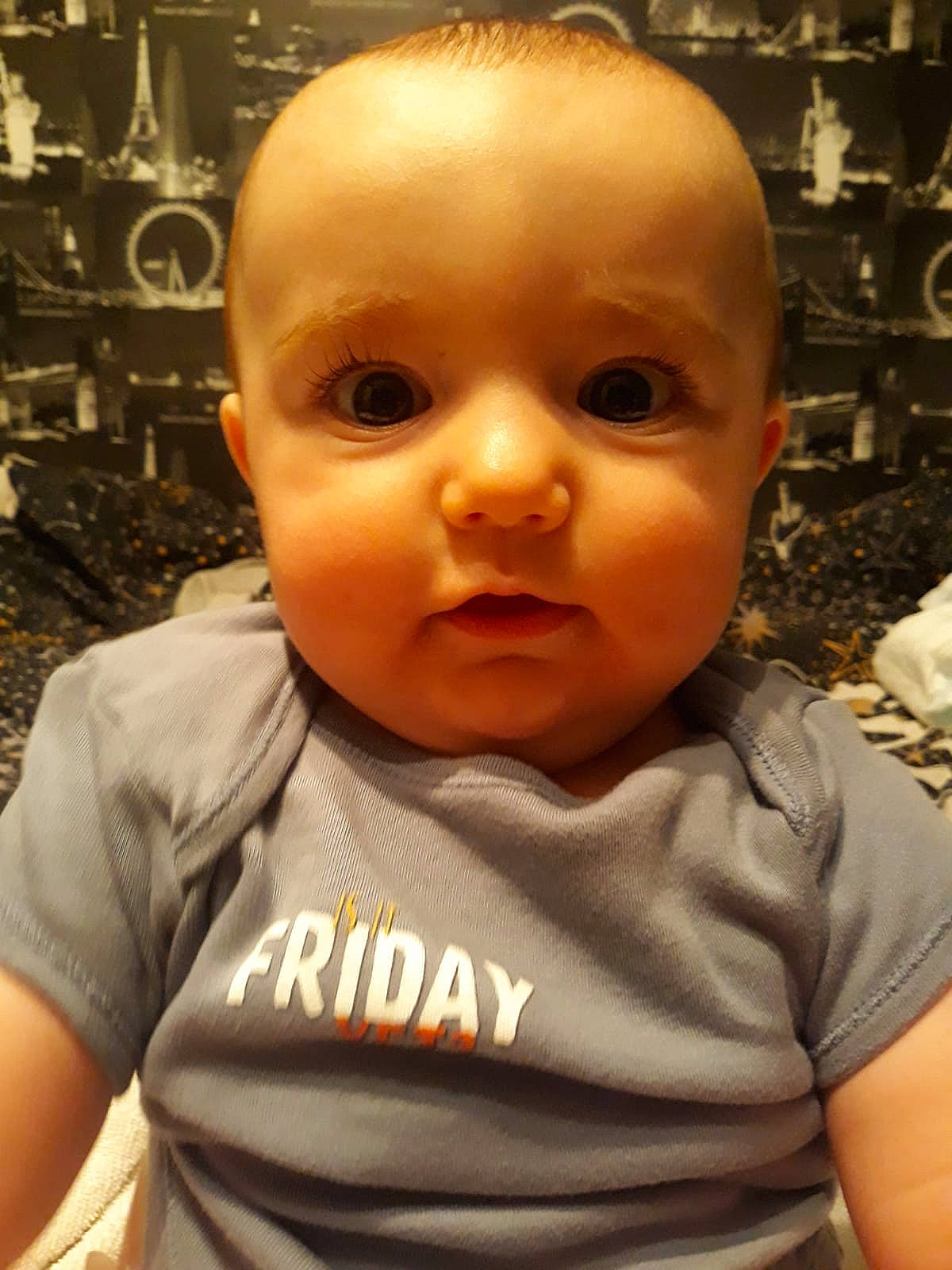 Jenson is registered to the contest to win money with this photo: baby, cheek, child, chin, face, forehead, head, mouth, nose, person, toddler