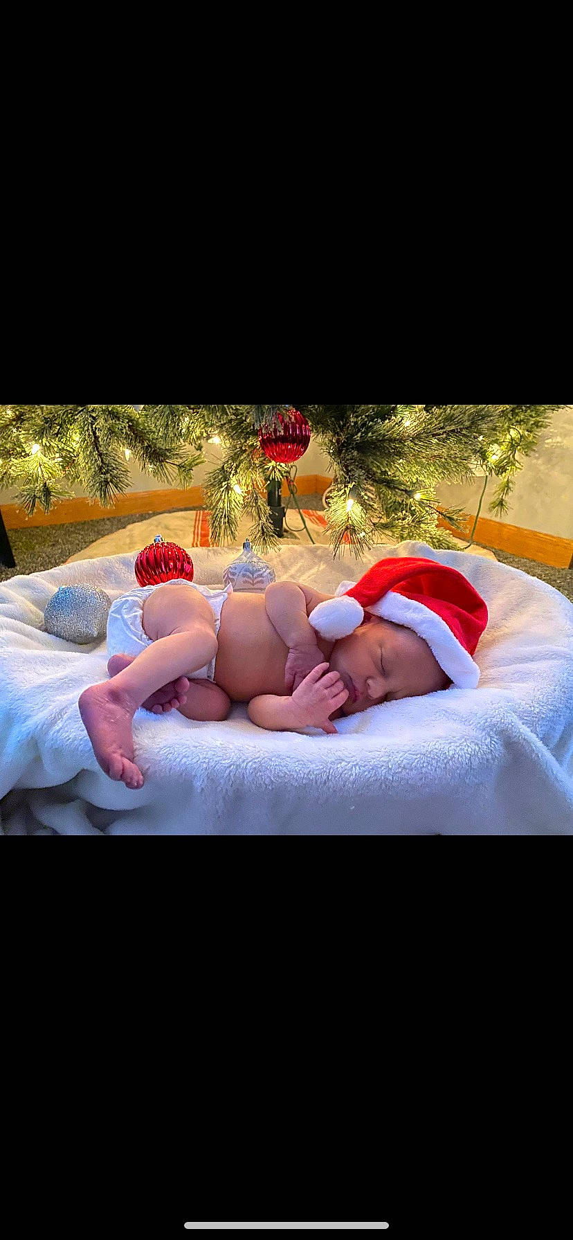 Huxley is registered to the contest to win money with this photo: baby, barechested, barefoot, child, comfort, event, flash_photography, flesh, foot, fun, happy, human_leg, leisure, linens, magenta, person, plant, room, shorts, thigh