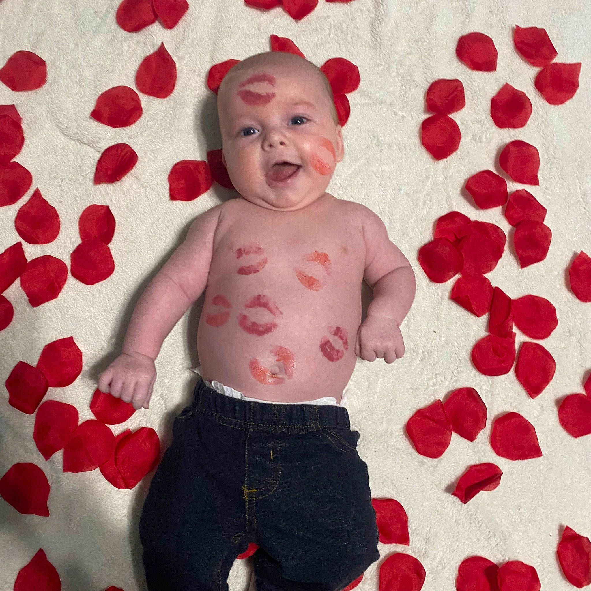 Huxley is registered to the contest to win money with this photo: baby, baby_toddler_clothing, carmine, child, circle, facial_expression, font, gesture, happy, linens, magenta, pattern, person, pink, product, red, sleeve, standing, t_shirt, toddler
