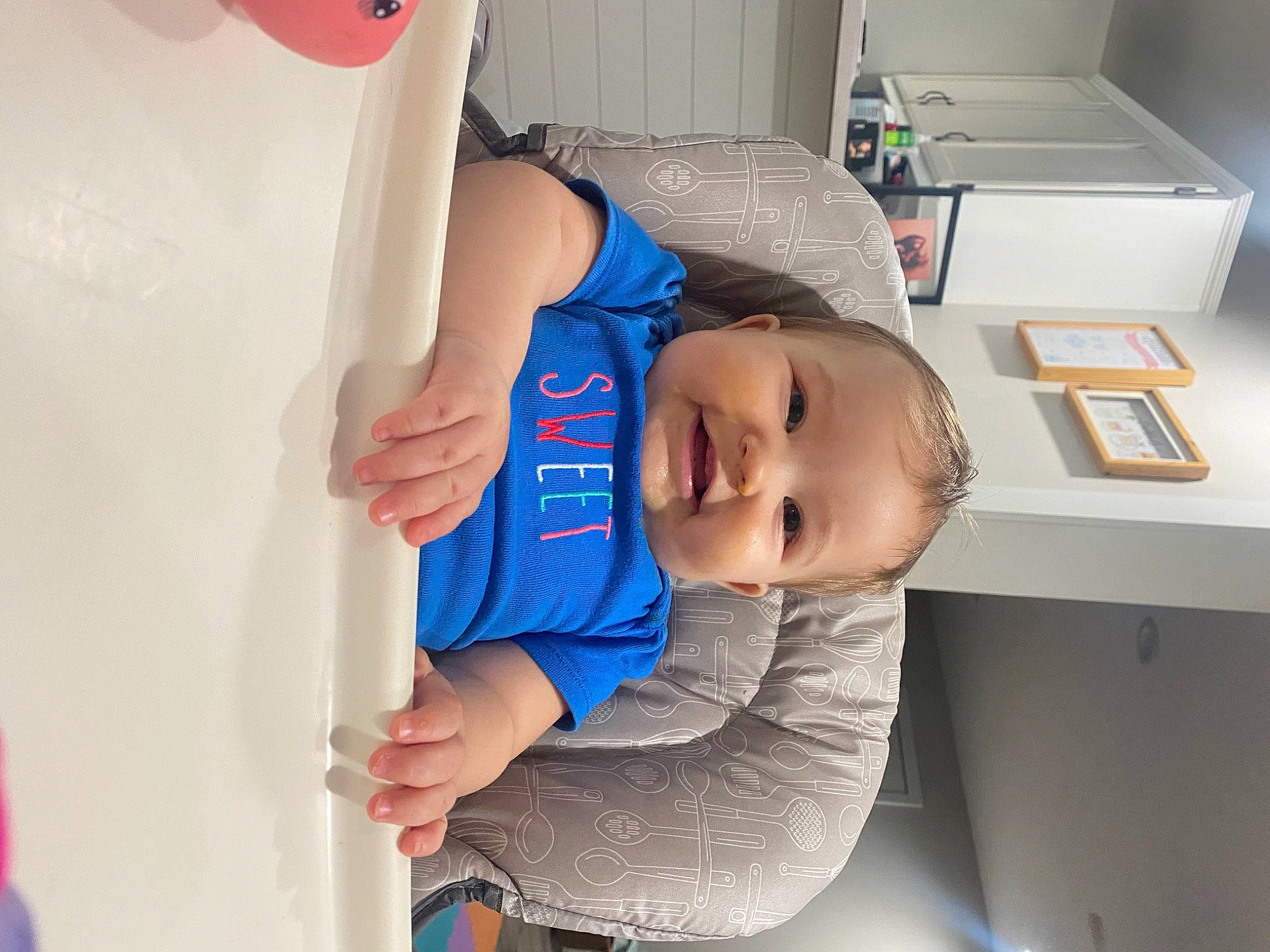 Matilda is registered to the contest to win money with this photo: baby, baby_products, baby_toddler_clothing, child, elbow, electric_blue, fun, happy, hat, person, room, smile, t_shirt, toddler