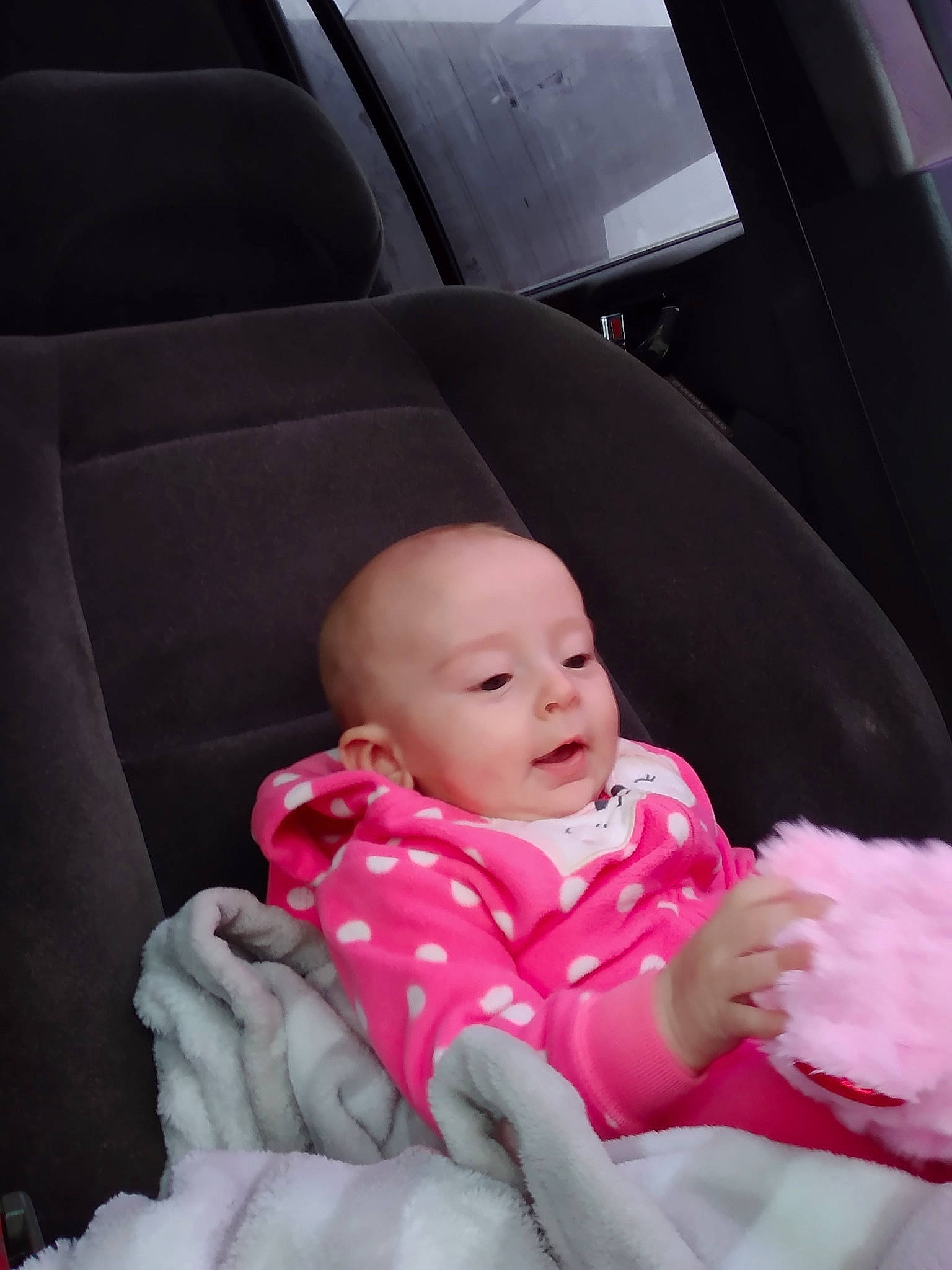 Kaiah is registered to the contest to win money with this photo: auto_part, automotive_design, automotive_exterior, baby, baby_toddler_clothing, car_seat, car_seat_cover, cheek, child, comfort, face, finger, gesture, head, mouth, person, personal_luxury_car, skin, thumb, toddler