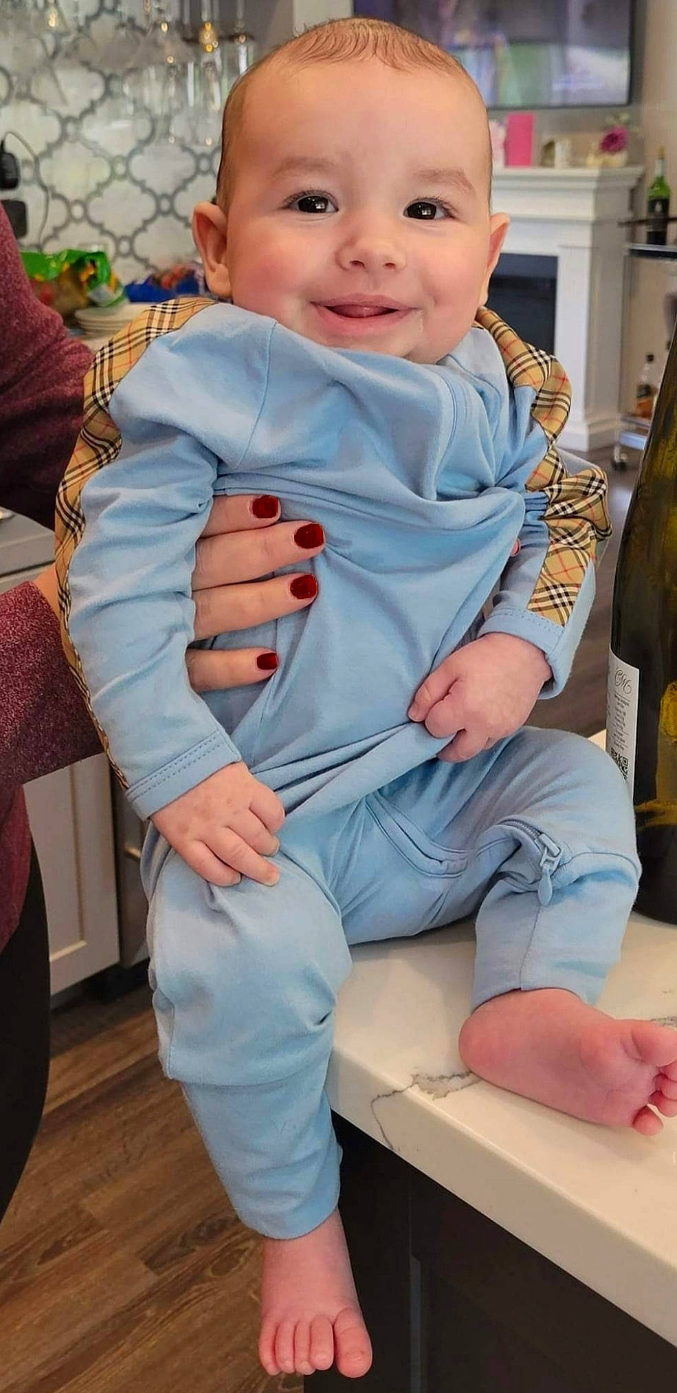 Joseph is registered to the contest to win money with this photo: baby, baby_products, baby_toddler_clothing, child, comfort, electric_blue, event, eye, formal_wear, fun, happy, human_leg, joint, joy, pattern, person, sitting, sleeve, smile, toddler