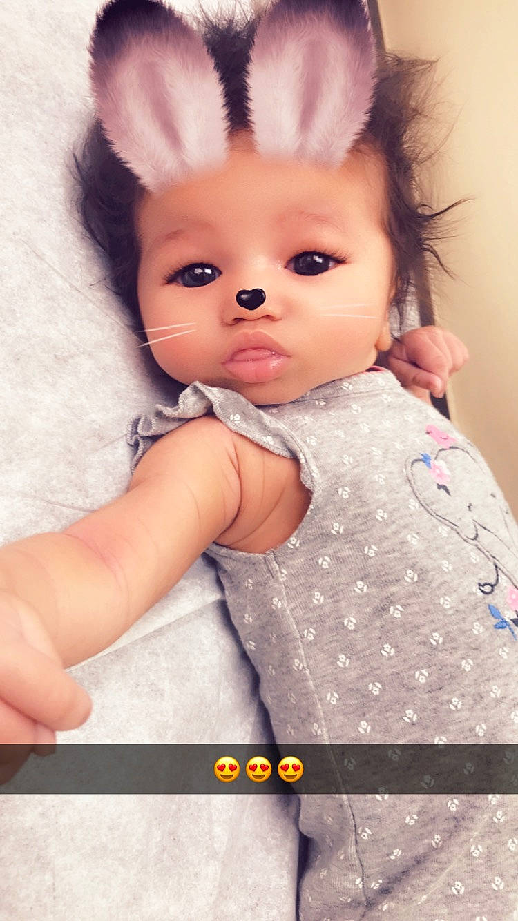 Zenleah is registered to the contest to win money with this photo: child, doll, ear, eye, face, finger, fur, girl, hand, head, infant, person, product, skin, textile, toddler