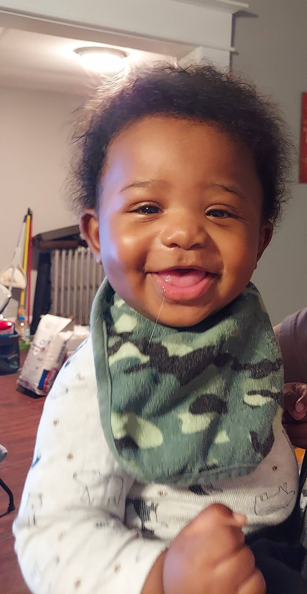 Daniel is registered to the contest to win money with this photo: cheek, ear, eye, eyebrow, forehead, hair, hand, happy, head, iris, jaw, lip, mouth, neck, nose, person, skin, sleeve, smile, standing