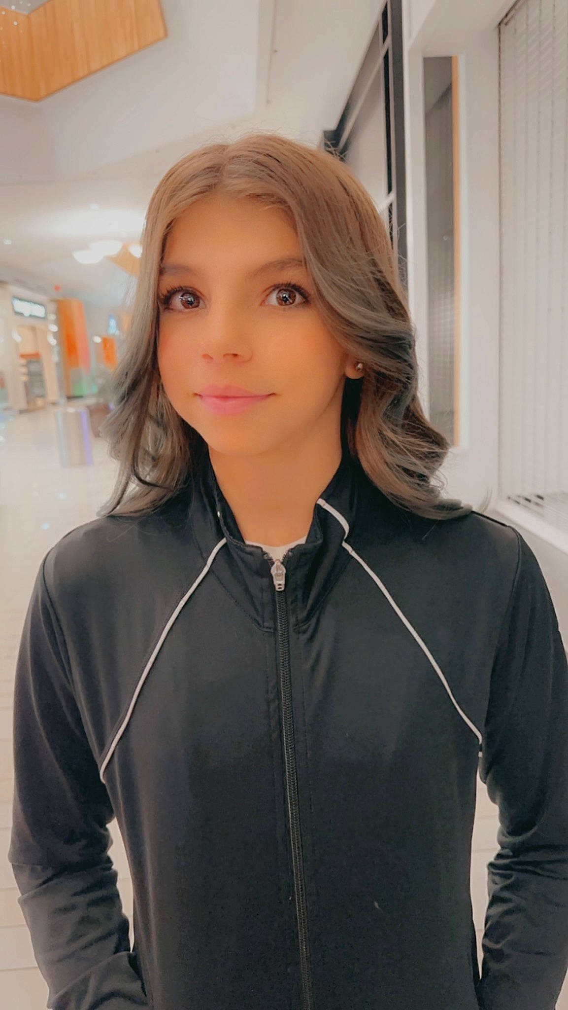 Jaelyn is registered to the contest to win money with this photo: black_hair, chin, eyebrow, eyewear, face, facial_expression, fashion, forehead, hairstyle, human, jacket, joint, joy, layered_hair, leather_jacket, lip, neck, people, person, shoulder