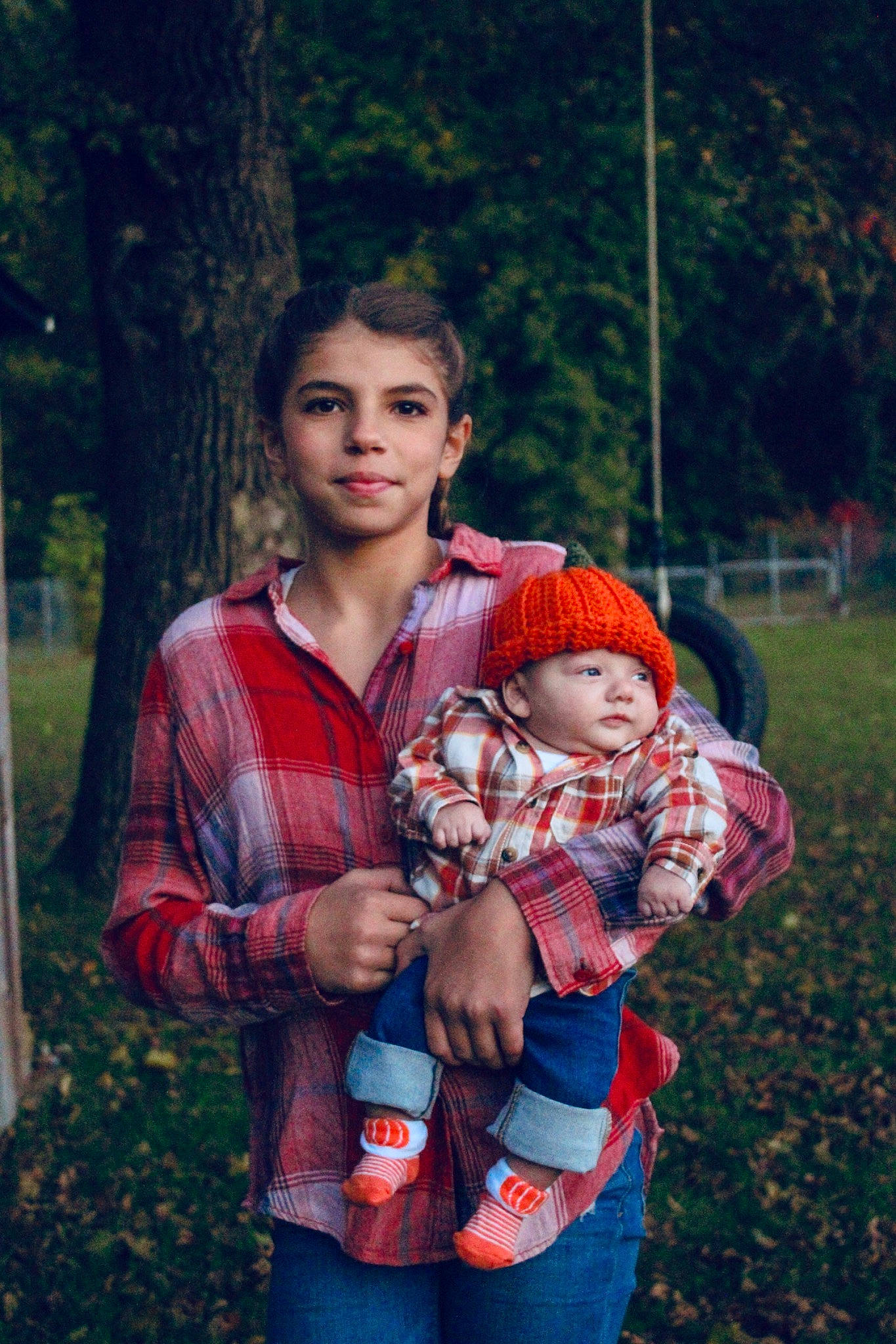 Jaelyn is registered to the contest to win money with this photo: baby, child, cool, eye, facial_expression, flash_photography, fun, grass, happy, headwear, joy, leisure, pattern, people_in_nature, person, plaid, plant, portrait_photography, recreation, sitting