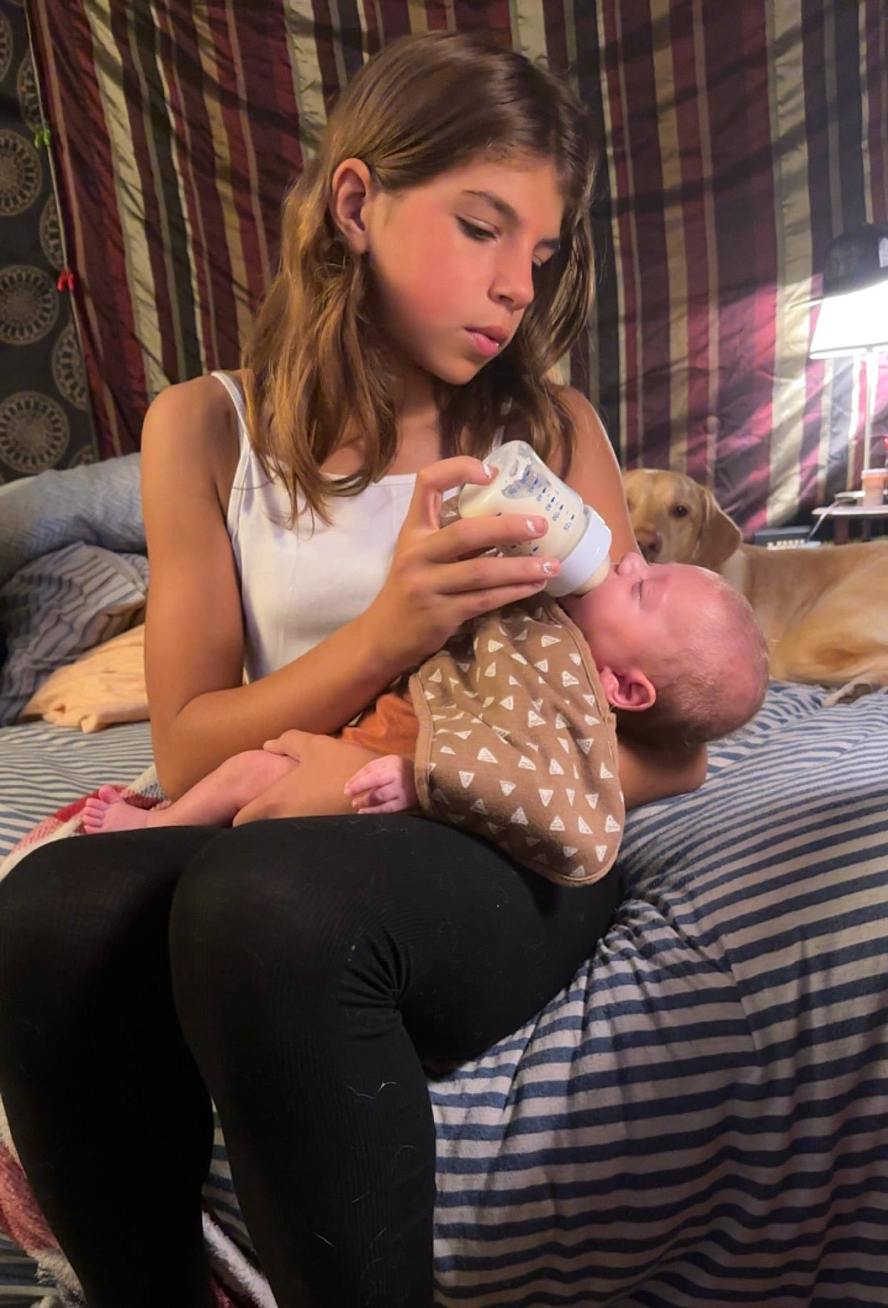 Jaelyn is registered to the contest to win money with this photo: abdomen, baby, blond, child, comfort, curtain, event, fun, happy, human_leg, jewellery, joint, knee, lap, leg, leisure, person, sitting, thigh, toddler