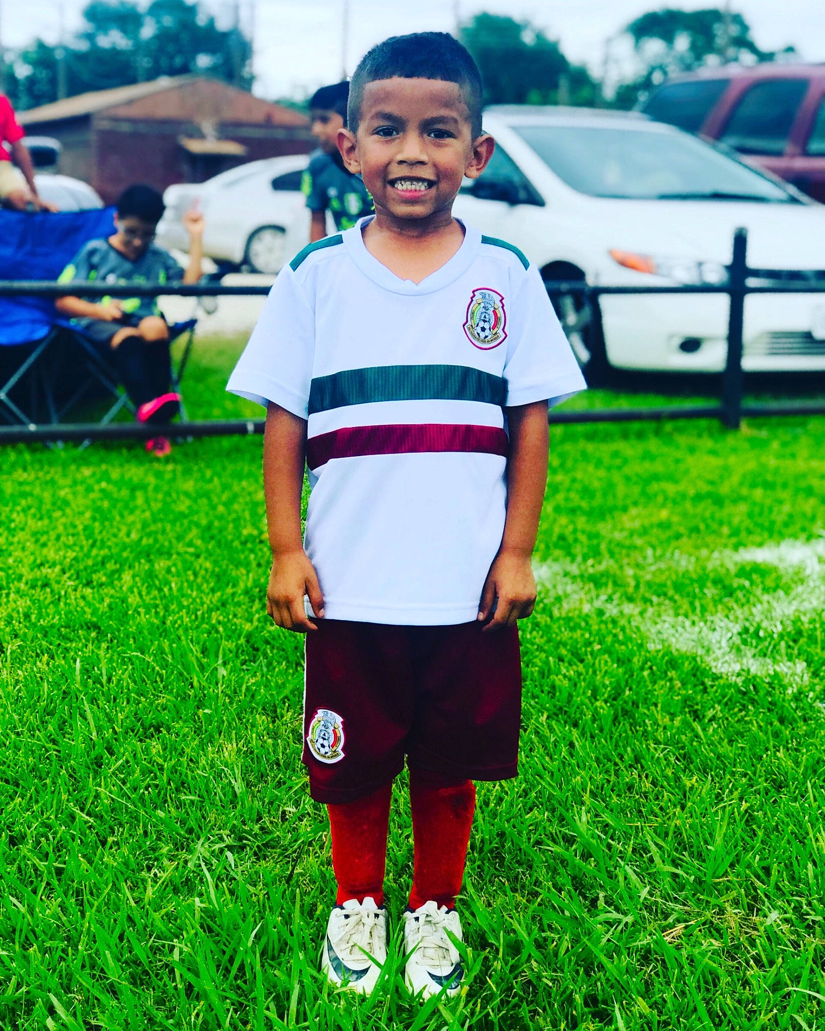 Jair joined the competition — help win amazing prizes! child, fun, grass, happy, joy, lawn, person, plant, red, shoe, style, t_shirt, toddler, youth