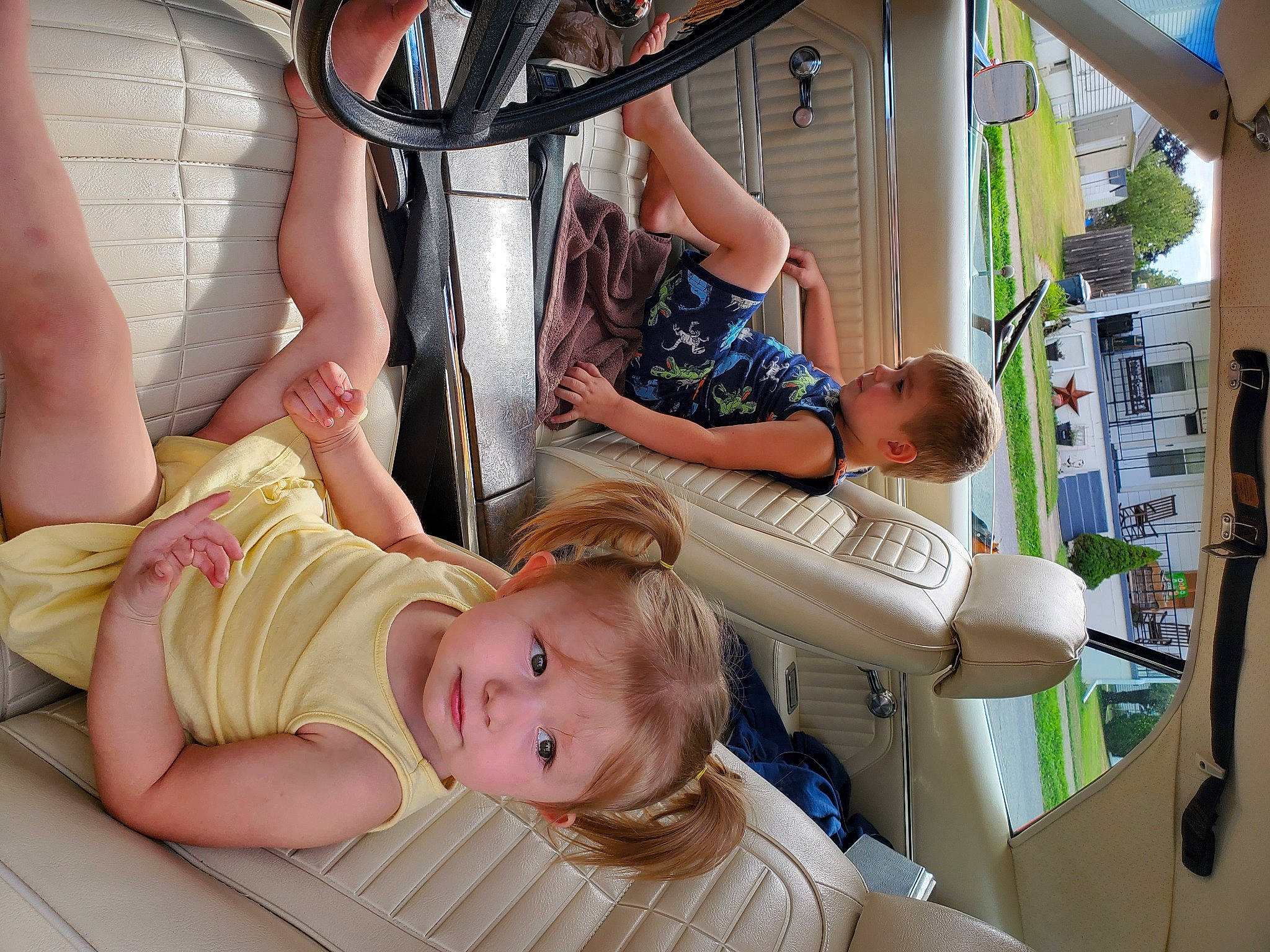 Michaela is registered to the contest to win money with this photo: arm, baby, baby_toddler_clothing, child, comfort, event, foot, fun, happy, hat, human_leg, leisure, person, recreation, room, shorts, summer, t_shirt, thigh, toddler