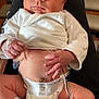 baby, newborn, infant, diaper, medical_wires, hospital_band, white_clothing, person, legs, feet, hand, face, monitoring, healthcare, skin, cute, lying_down, indoors, closeup, expression