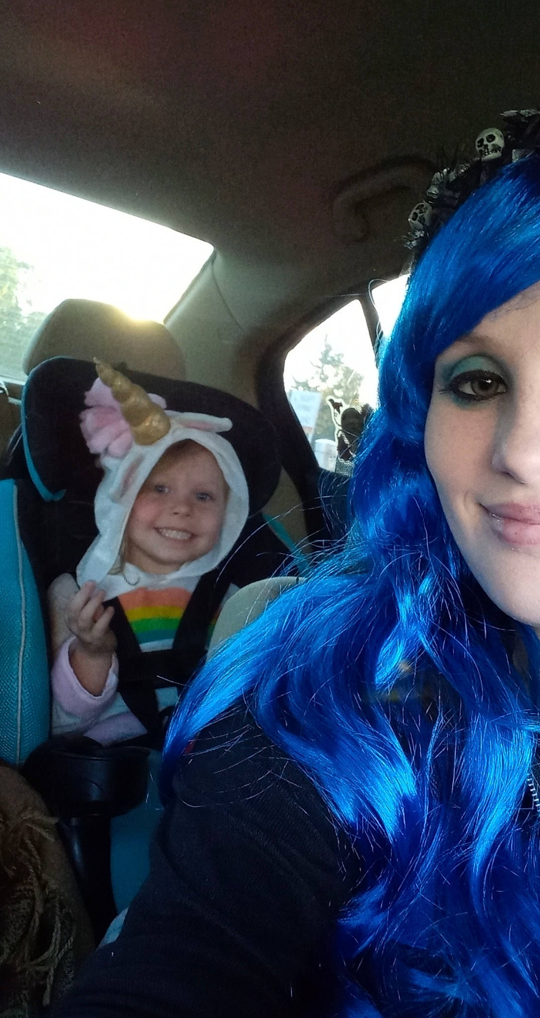 Dalilah is registered to the contest to win money with this photo: beauty, black_hair, blue, car_seat, car_seat_cover, cool, electric_blue, eye, eyebrow, face, happy, head, headgear, headwear, iris, joy, long_hair, organ, person, smile