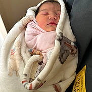 Amelia Rose joined the competition — help win amazing prizes! newborn, baby, blanket, sleeping, wrapped, soft, fluffy, animal_print, hospital, visitor_pass, pink_clothing, face, peaceful, infant, resting, closeup, indoor, cute, child, portrait