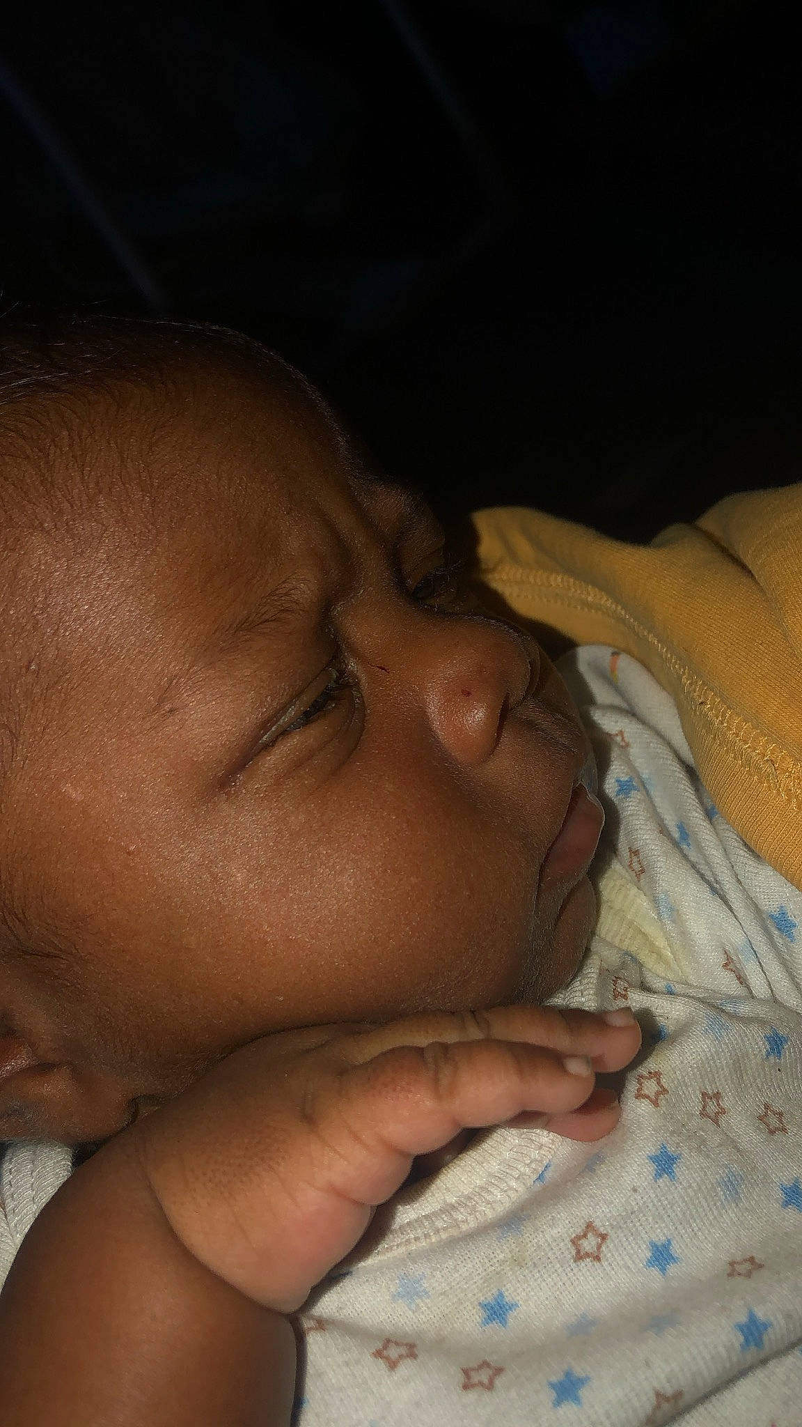 King is registered to the contest to win money with this photo: arm, baby, bedtime, cheek, close_up, comfort, ear, eyebrow, eyelash, gesture, human_body, iris, lip, mouth, nail, neck, nose, person, skin, thumb