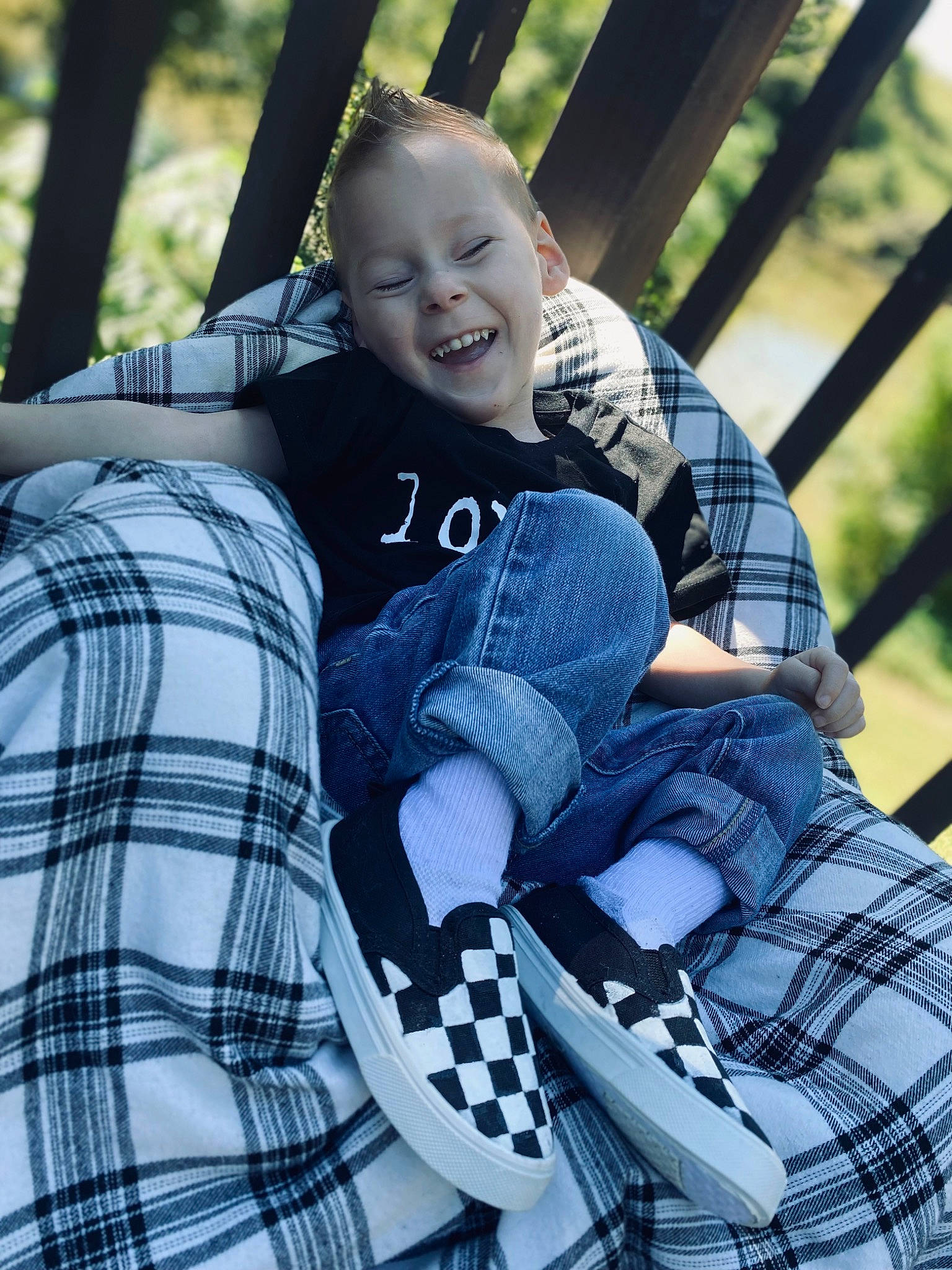Weston Duncan is registered to the contest to win money with this photo: baby_toddler_clothing, child, cool, electric_blue, fun, grass, happy, human, leisure, outerwear, pattern, people_in_nature, person, plaid, sleeve, smile, snapshot, style, tartan, toddler