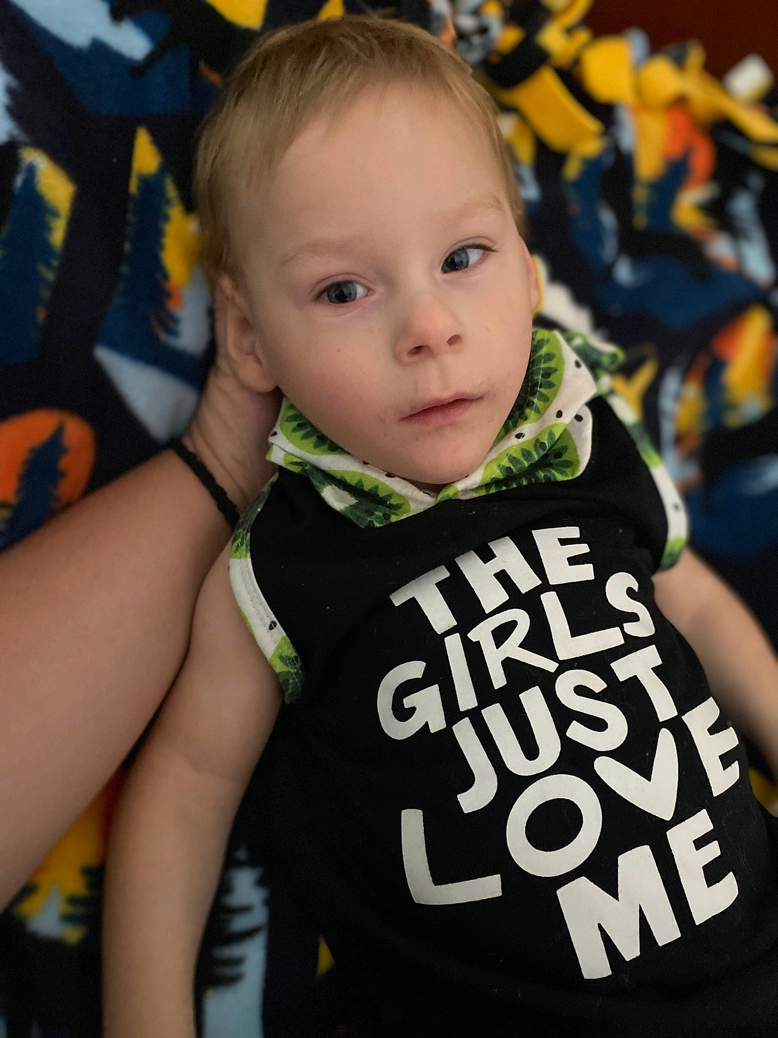 Weston Duncan is registered to the contest to win money with this photo: child, cool, crowd, event, fan, fashion, fun, grass, happy, person, player, product, public_event, sleeve, sportswear, t_shirt, team, toddler, top, vest