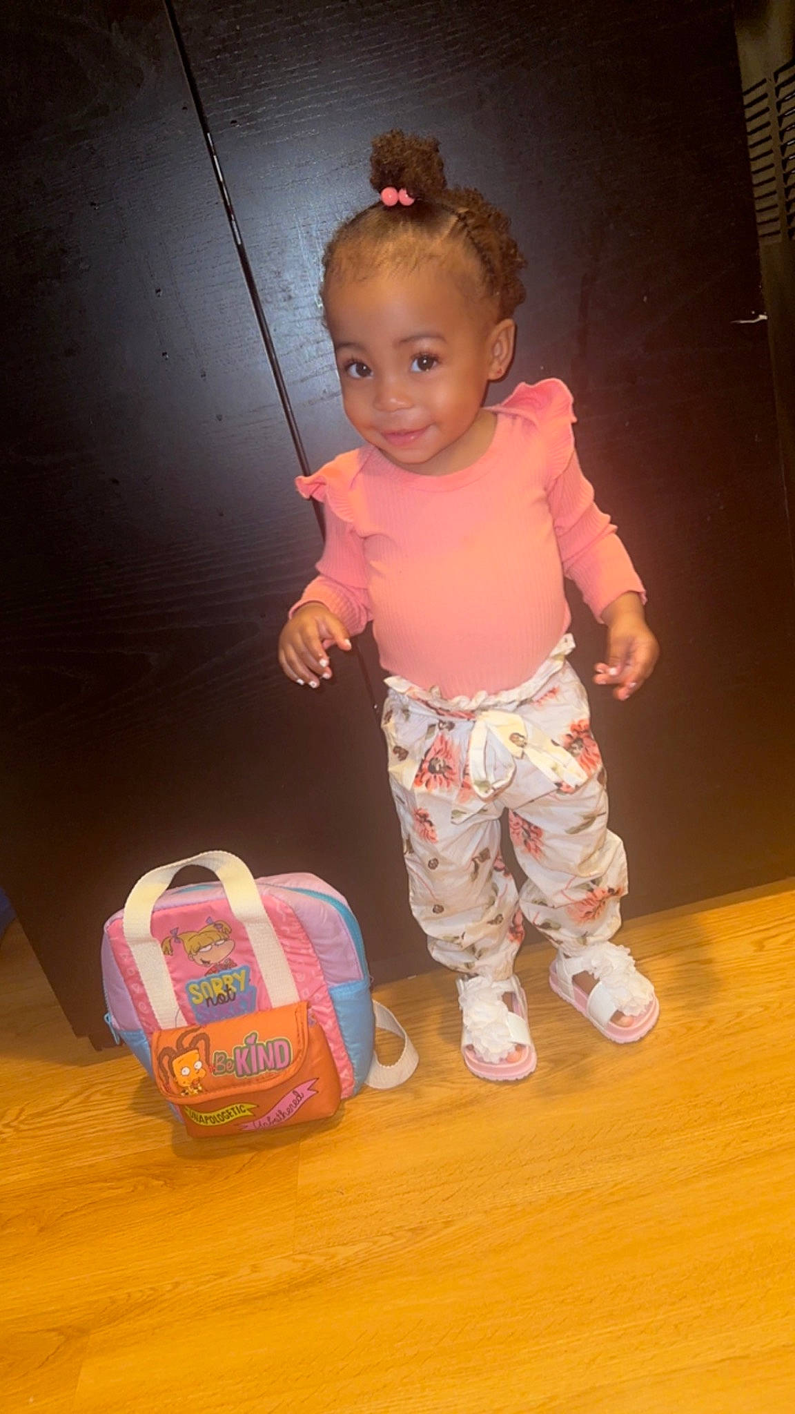 Dream is registered to the contest to win money with this photo: baby, baby_toddler_clothing, backpack, bag, cheek, child, flooring, fun, happy, joy, luggage_and_bags, magenta, peach, person, pink, play, room, shoe, sleeve, sneakers