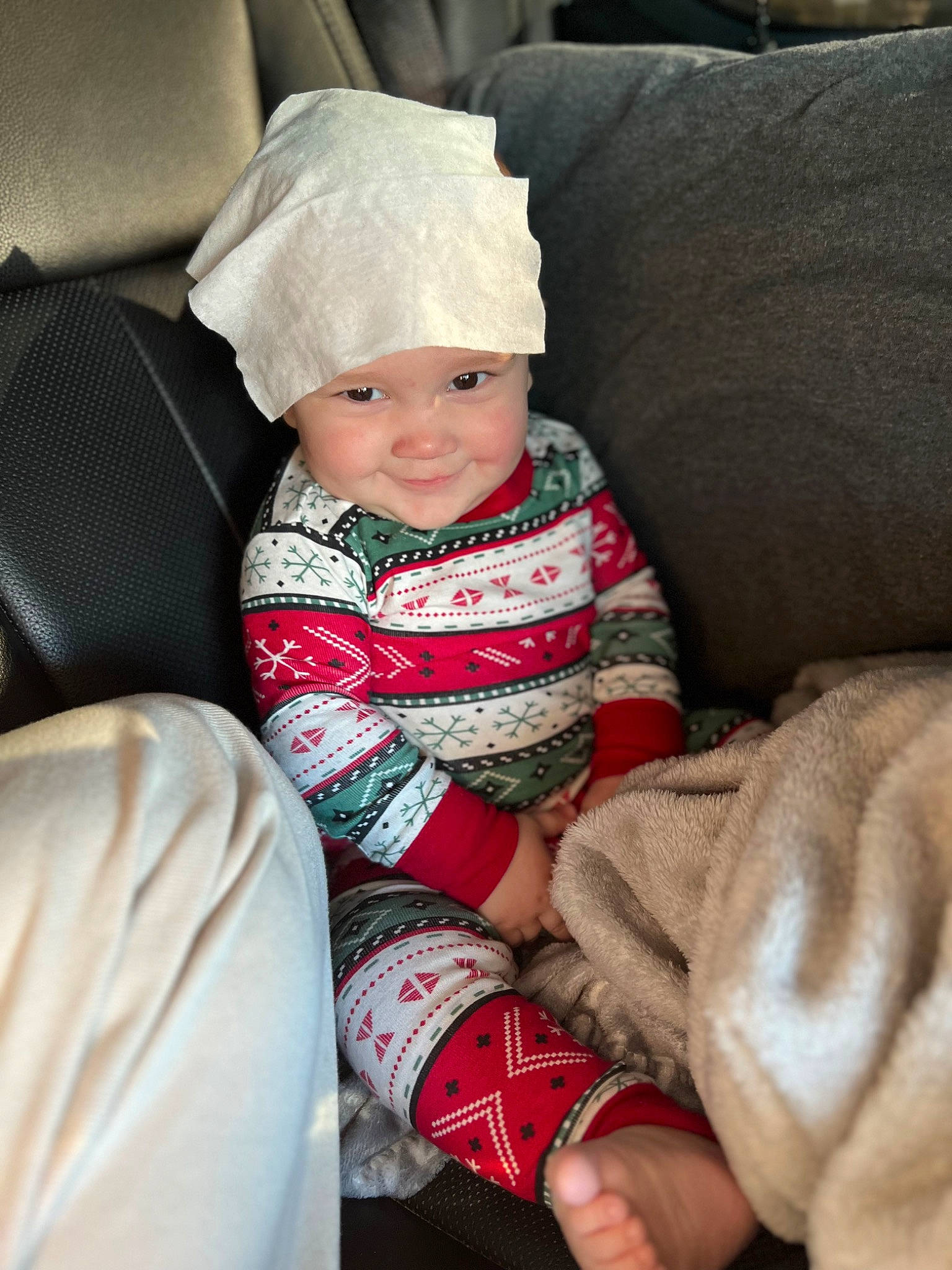 Kayson is registered to the contest to win money with this photo: baby, baby_toddler_clothing, cap, child, comfort, costume_hat, couch, fashion_accessory, happy, headwear, human_body, human_leg, joy, knee, lap, leg, mammal, person, sitting, sleeve
