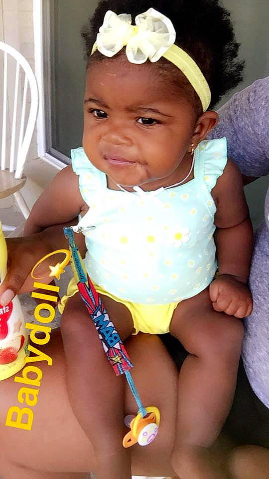 Averi? joined the competition — help win amazing prizes! abdomen, baby_products, child, day, finger, girl, hair_accessory, headgear, headwear, infant, leg, person, product, skin, smile, toddler, trunk, yellow