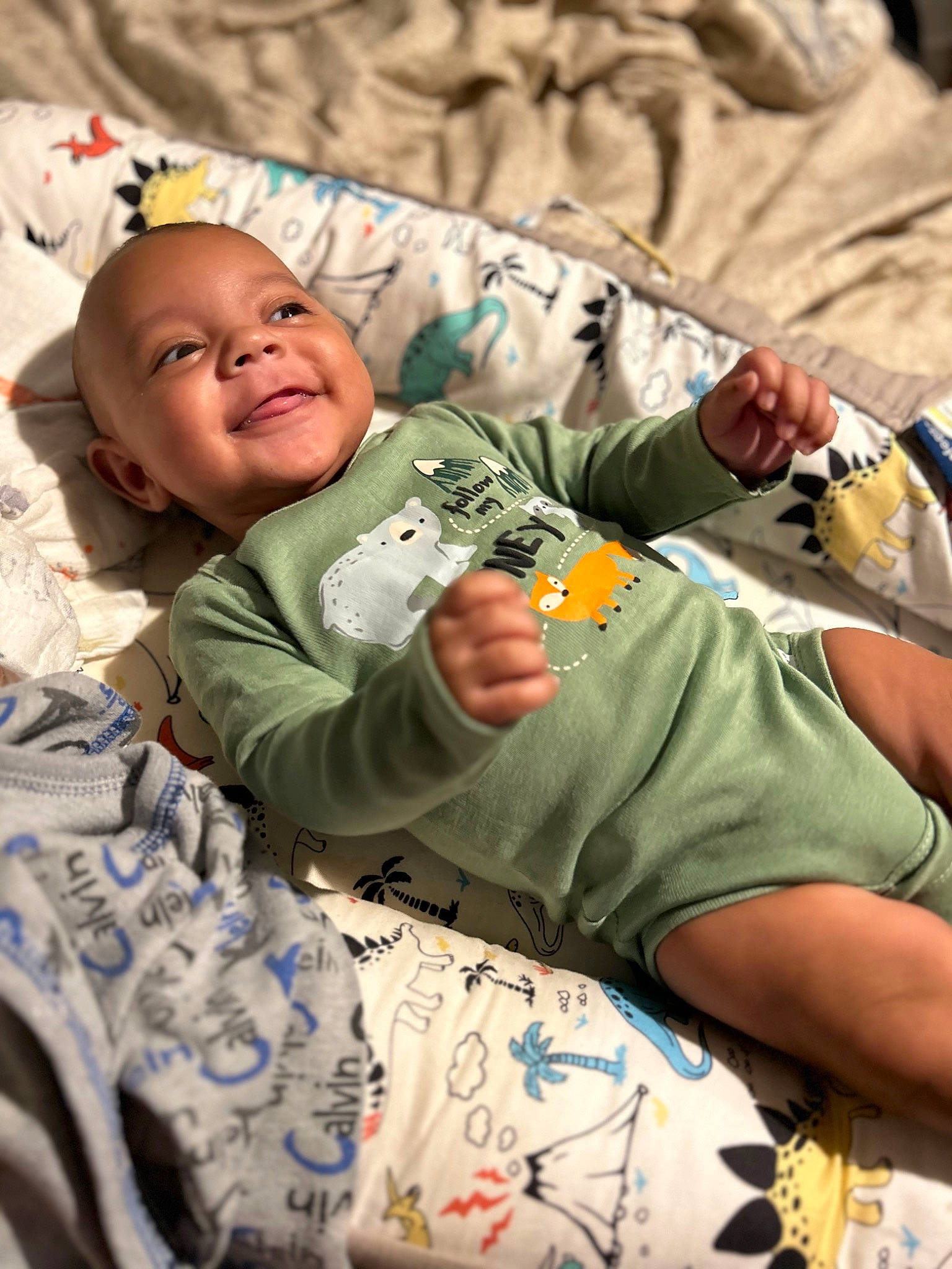 Elijah joined the competition — help win amazing prizes! baby, baby_toddler_clothing, child, comfort, eyewear, fun, grass, hand, happy, joy, leisure, linens, person, play, portrait_photography, recreation, sitting, smile, t_shirt, toddler